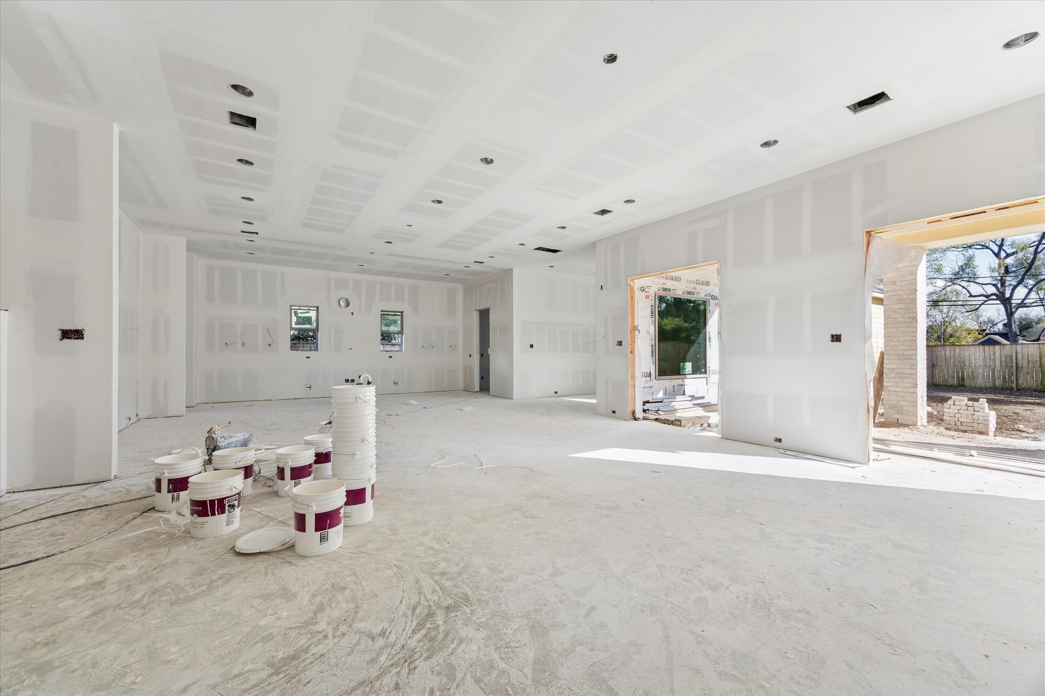 515 West 33rd Street Houston, TX 77018 - Photo 10 of 35 a bedroom with furniture and a chandelier