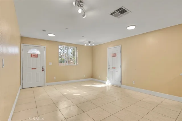 an empty room with windows