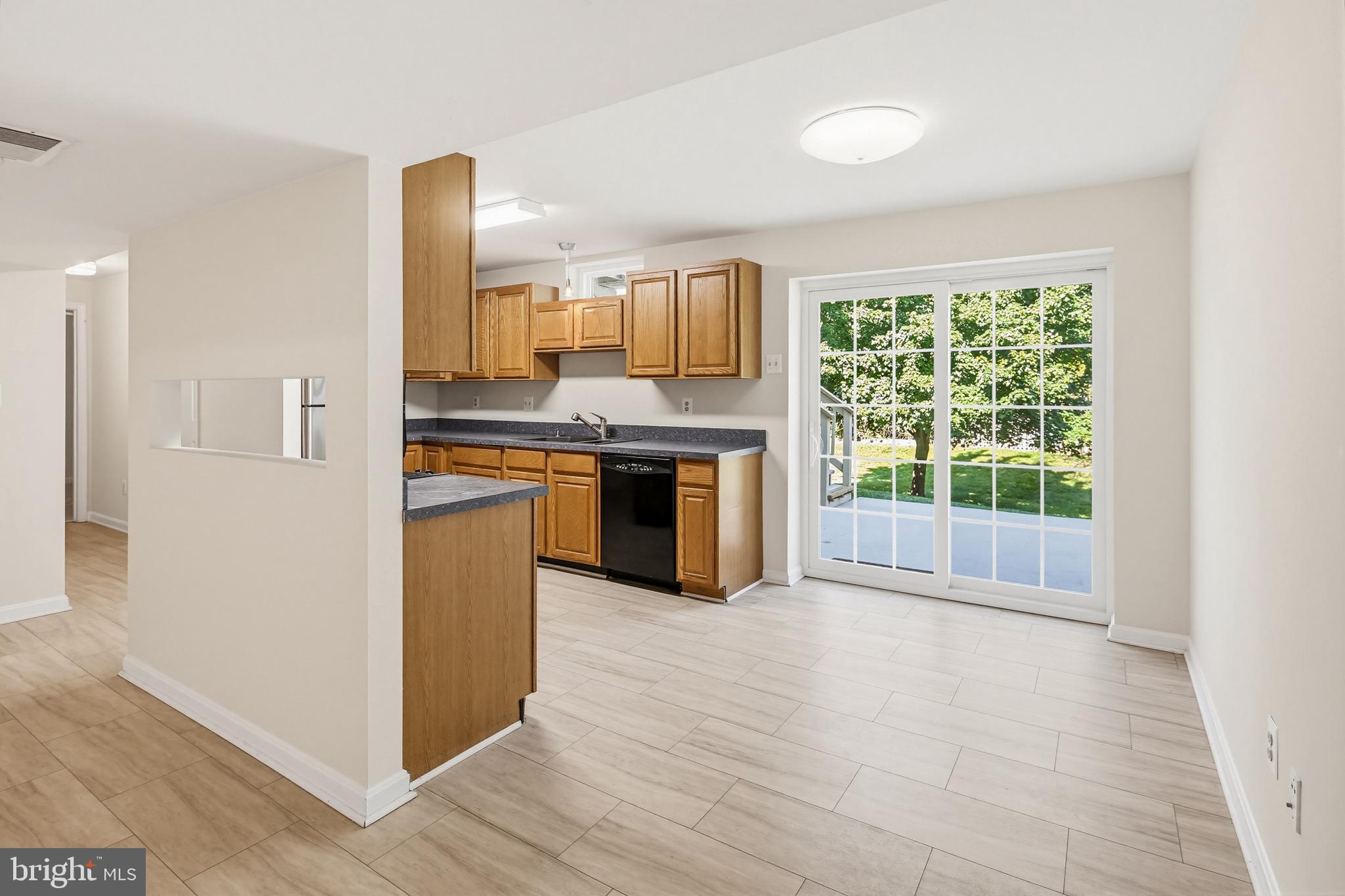 8266 Spring Branch Court Laurel, MD 20723 - Photo 51 of 73 Bfast room off lower level kitchen & SGD to patio