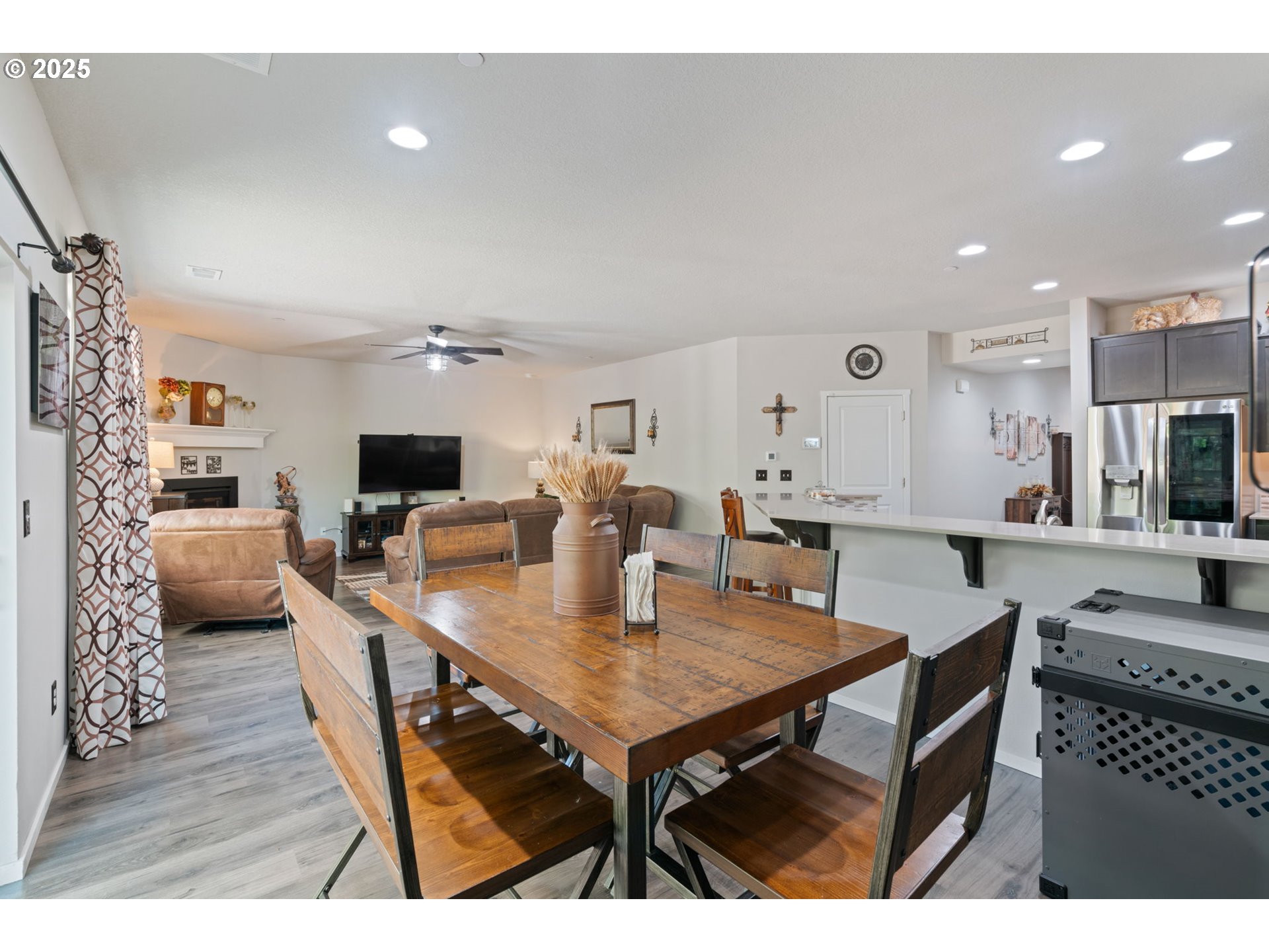 1707 Northeast 37th Avenue Camas, WA 98607 - Photo 17 of 44 a view of a dining room with furniture and wooden floor