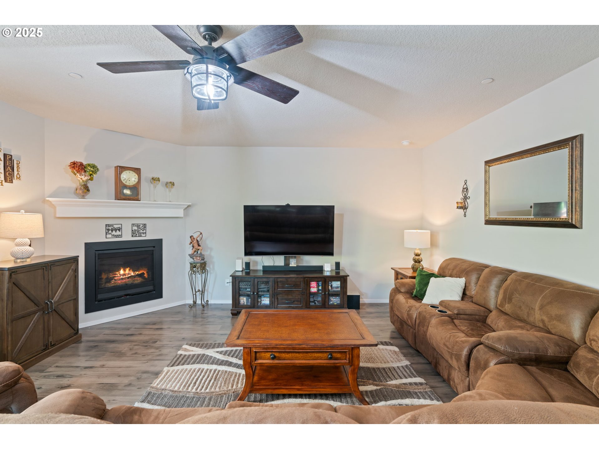 1707 Northeast 37th Avenue Camas, WA 98607 - Photo 20 of 44 a living room with furniture and a fireplace