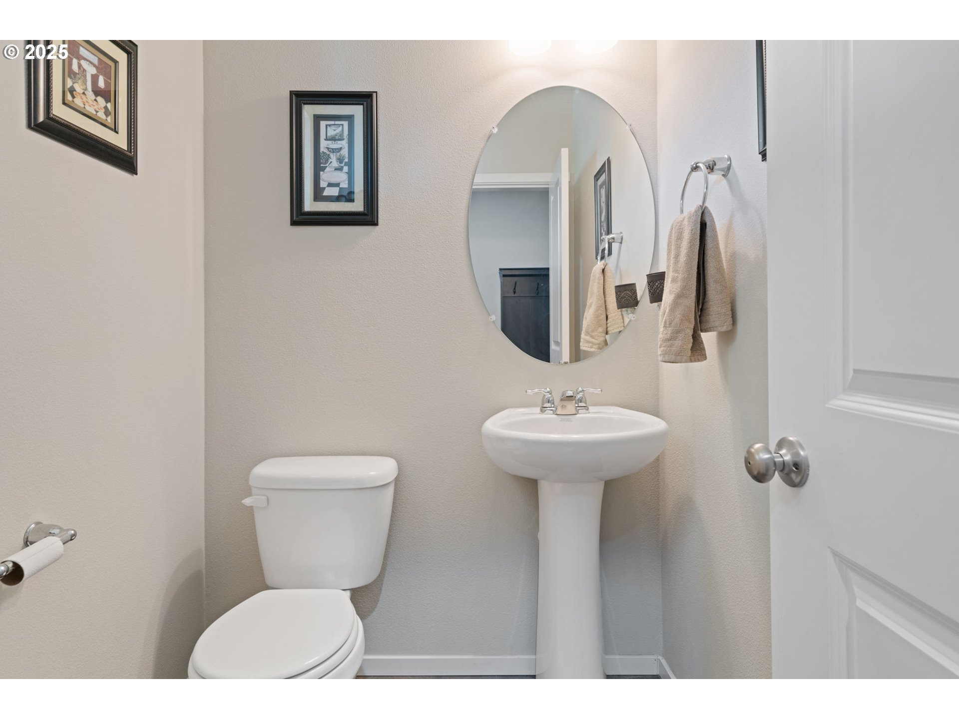 1707 Northeast 37th Avenue Camas, WA 98607 - Photo 21 of 44 a bathroom with a toilet sink and mirror
