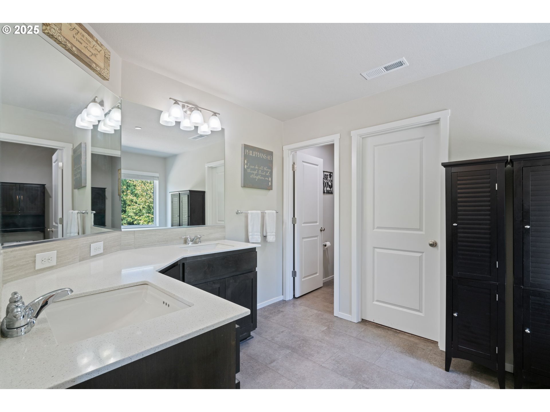 1707 Northeast 37th Avenue Camas, WA 98607 - Photo 25 of 44 a large bathroom with a sink vanity and a mirror