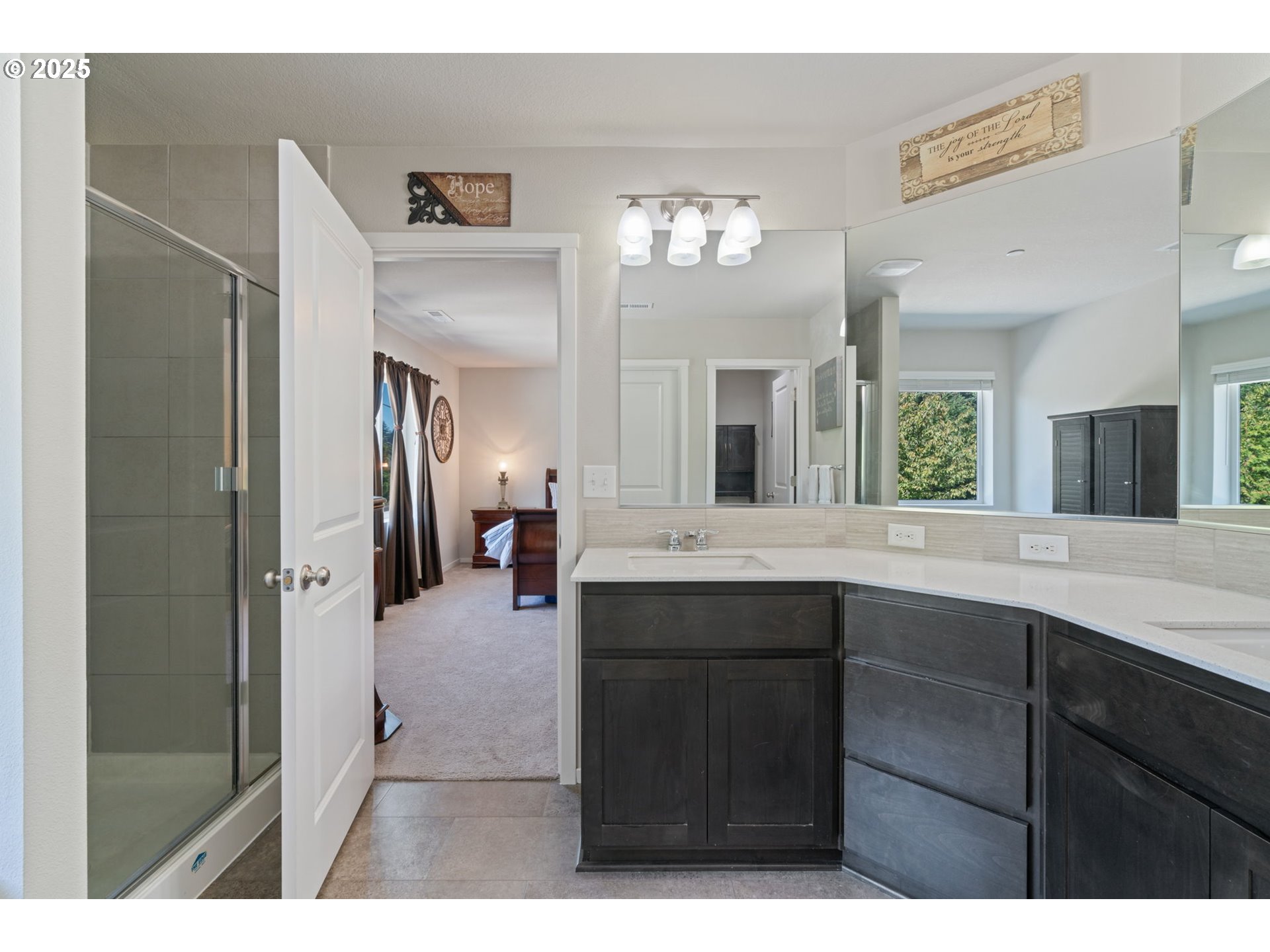 1707 Northeast 37th Avenue Camas, WA 98607 - Photo 28 of 44 a en suite bathroom with a sink double vanity and a mirror