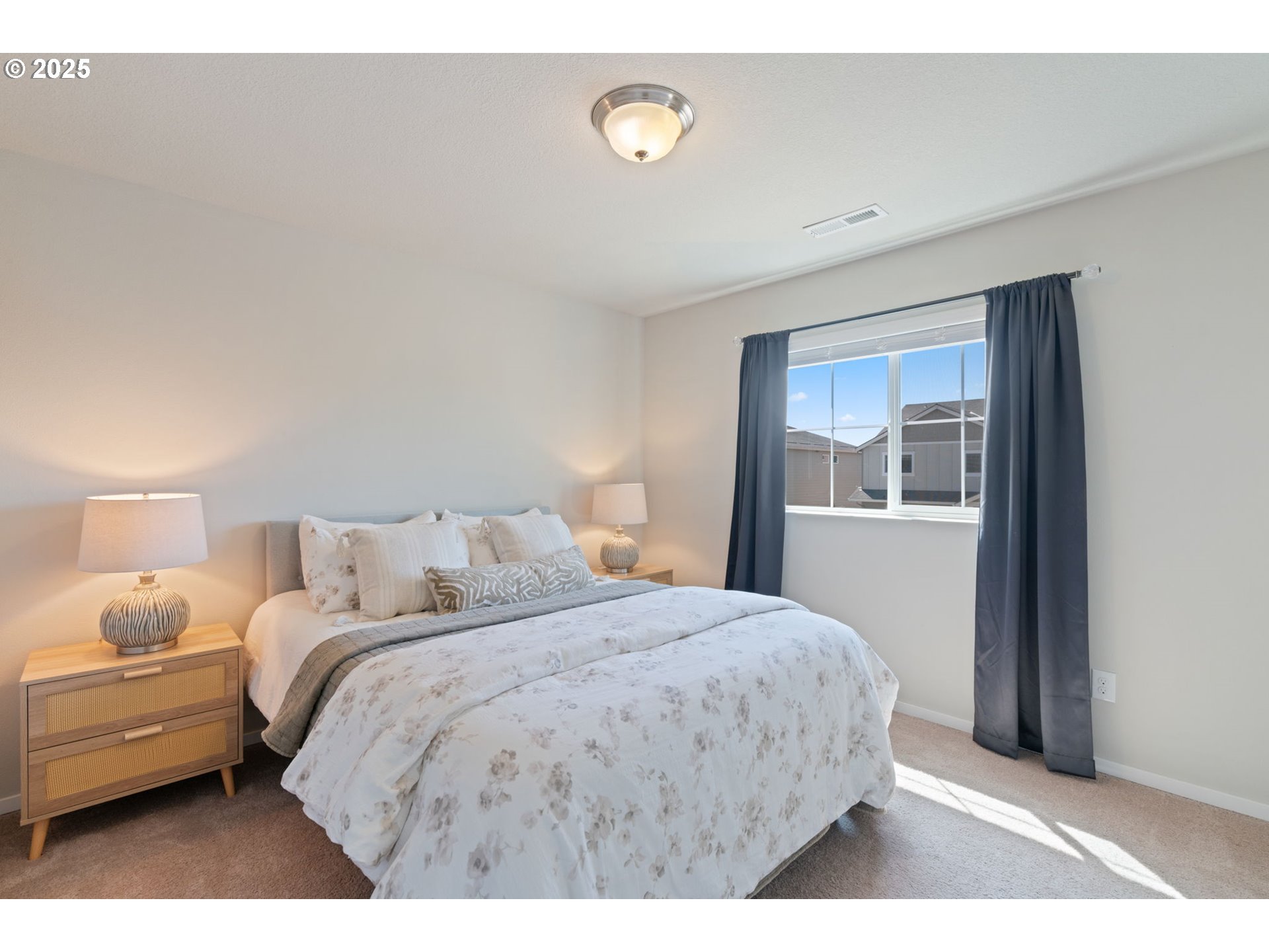 1707 Northeast 37th Avenue Camas, WA 98607 - Photo 30 of 44 a bedroom with a bed and a window