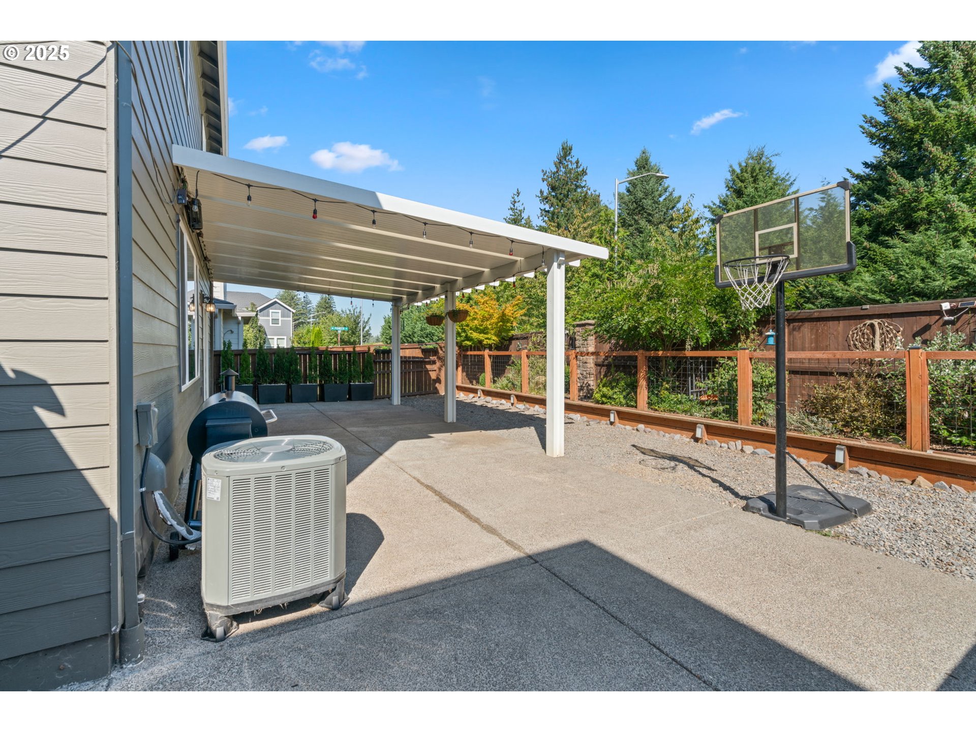 1707 Northeast 37th Avenue Camas, WA 98607 - Photo 38 of 44 a backyard of a house with table and chairs