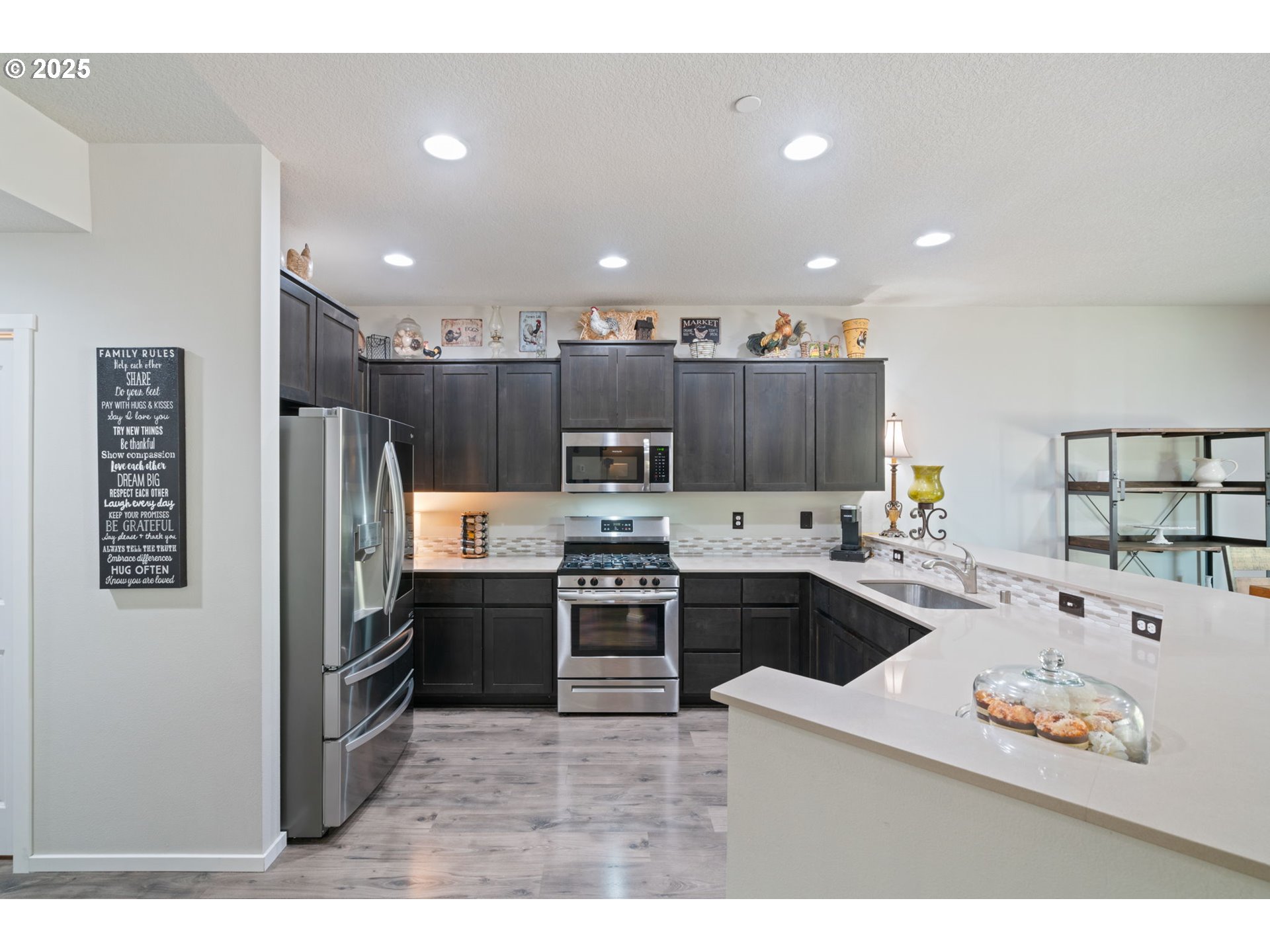 1707 Northeast 37th Avenue Camas, WA 98607 - Photo 9 of 44 a kitchen with a refrigerator and a stove