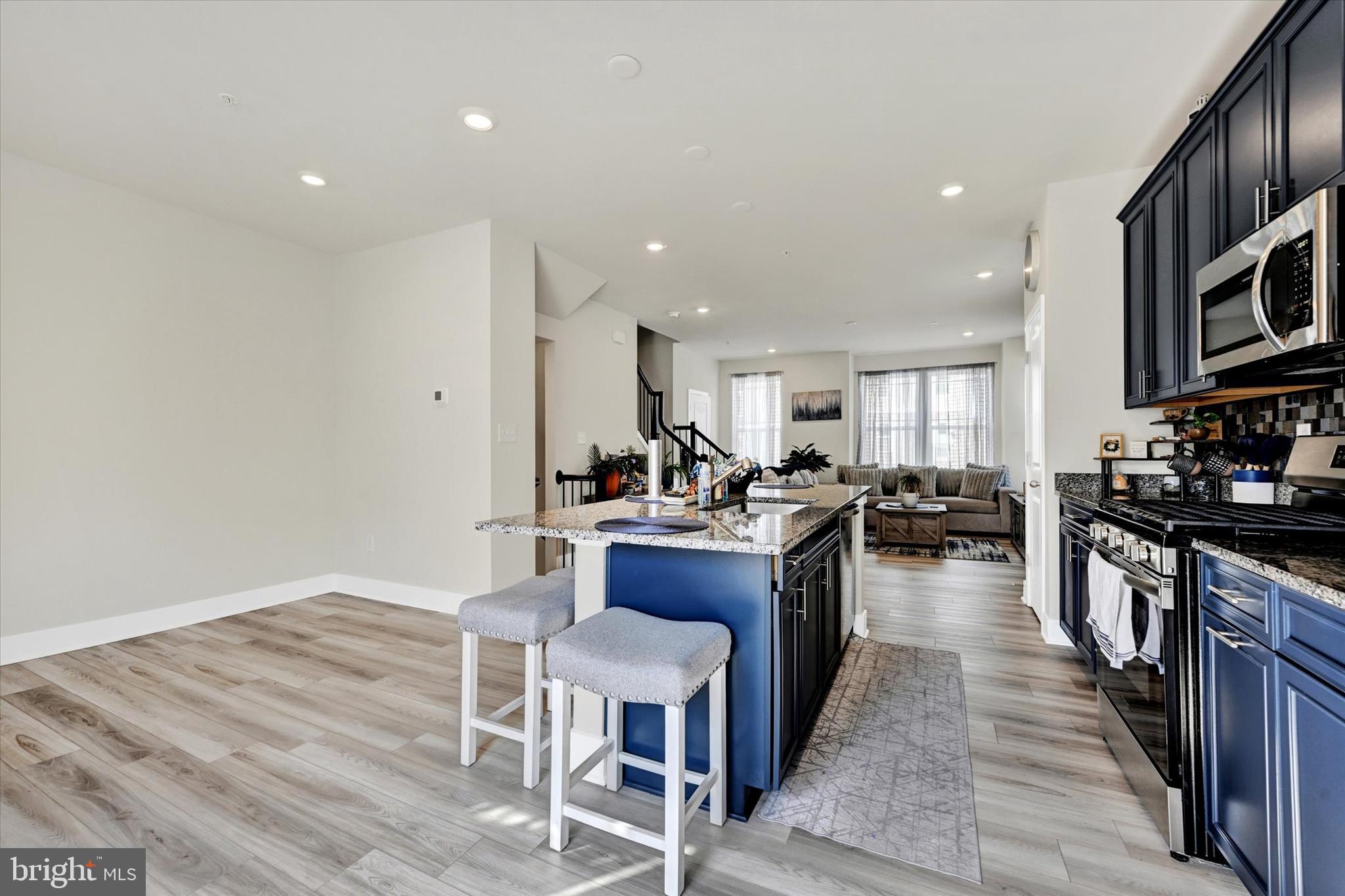 1819 Betterton Road Essex, MD 21221 - Photo 11 of 27 a kitchen with lots of counter top space and stainless steel appliances