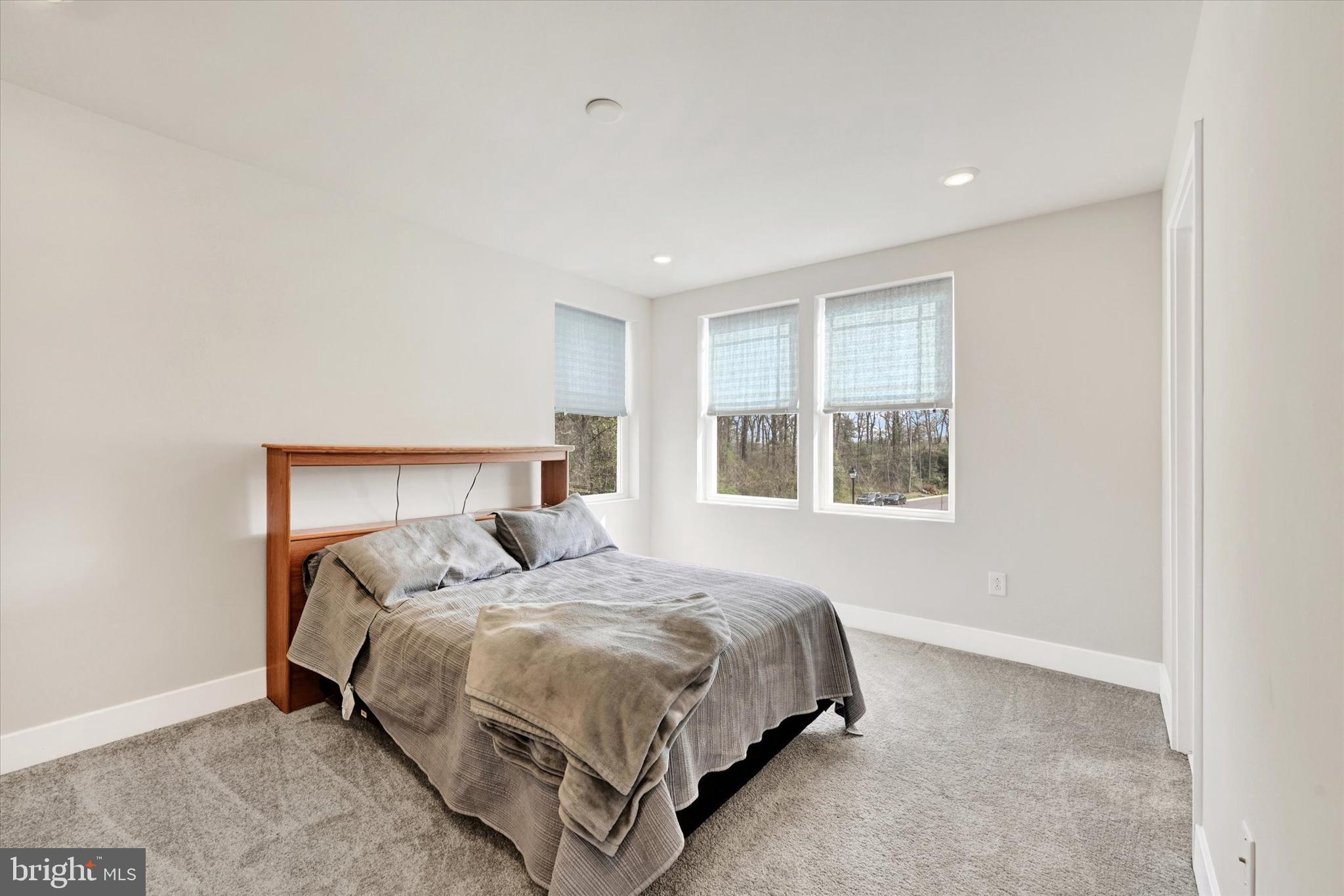 1819 Betterton Road Essex, MD 21221 - Photo 17 of 27 a bedroom with a bed and window