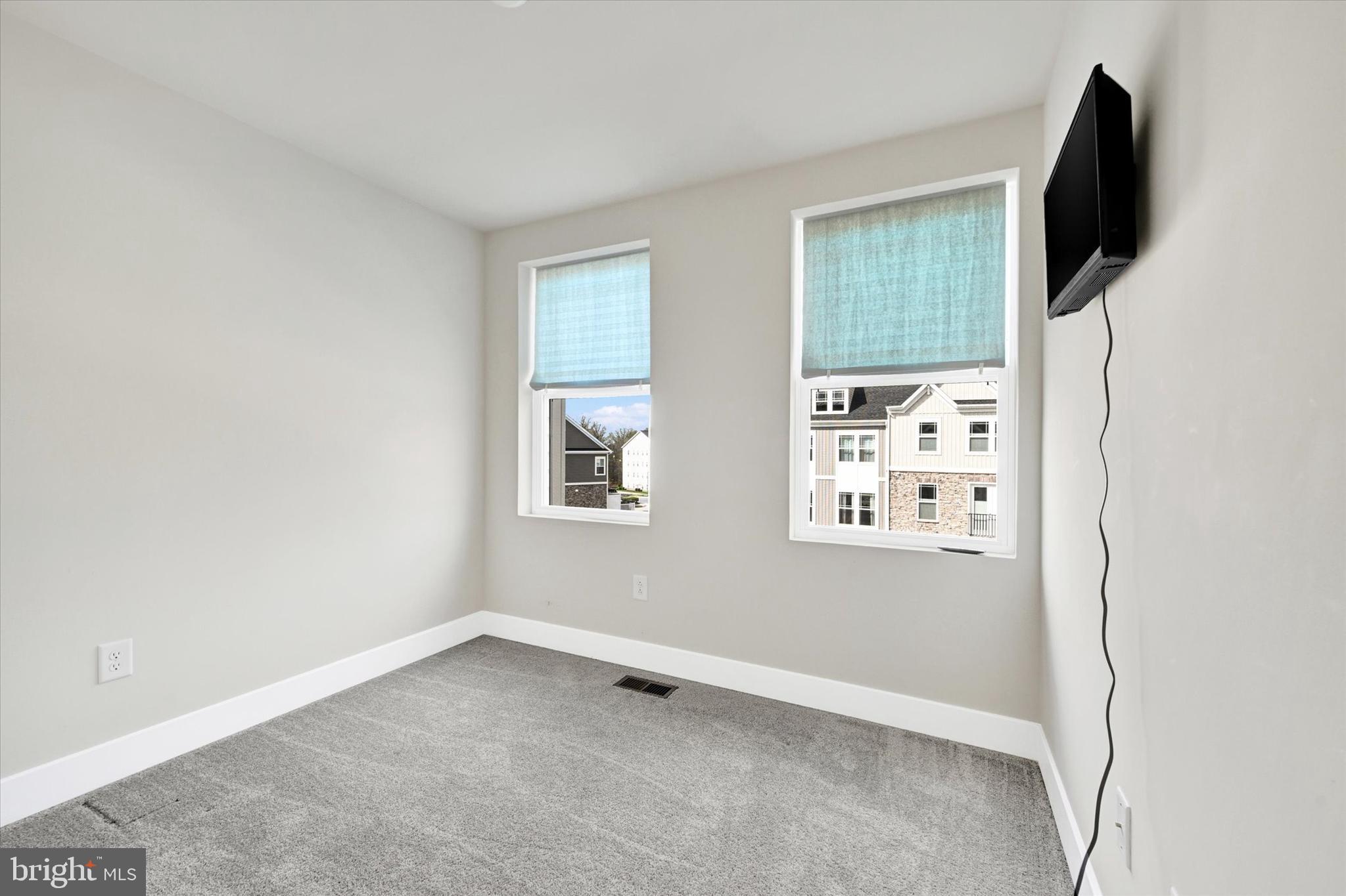 1819 Betterton Road Essex, MD 21221 - Photo 21 of 27 an empty room with windows