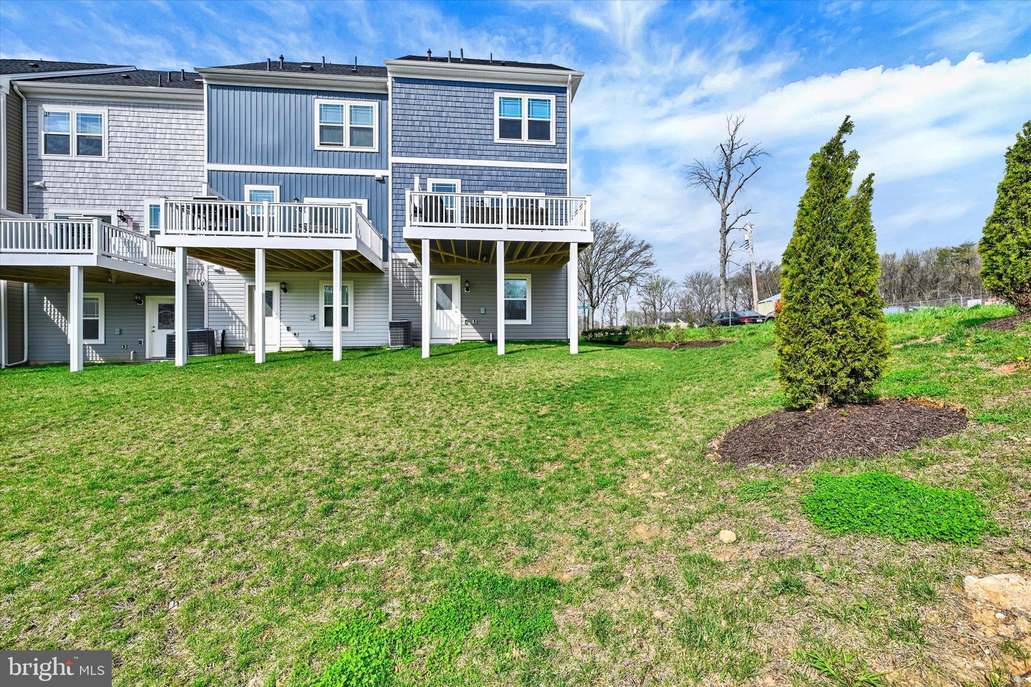 1819 Betterton Road Essex, MD 21221 - Photo 25 of 27 a front view of a house with a garden