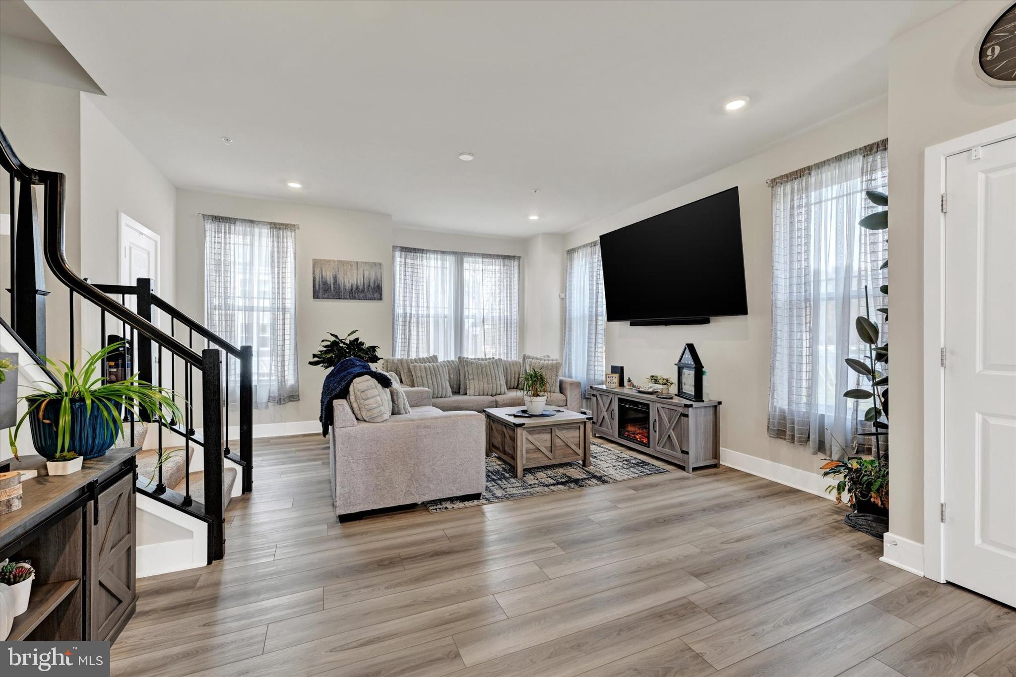 1819 Betterton Road Essex, MD 21221 - Photo 6 of 27 a living room with furniture and a flat screen tv
