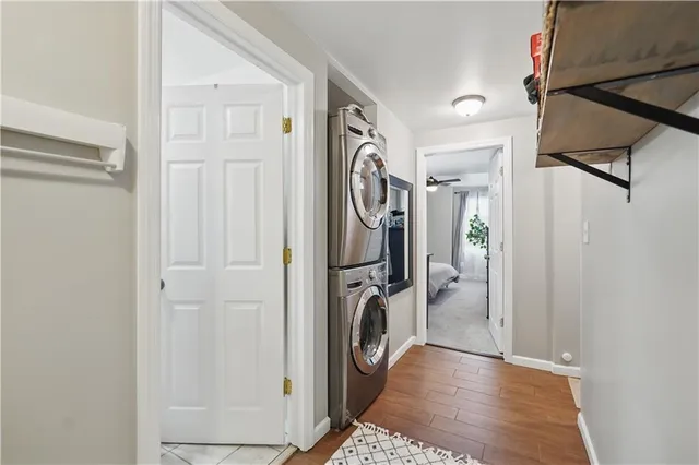 a view of a hallway with a washer and dryer
