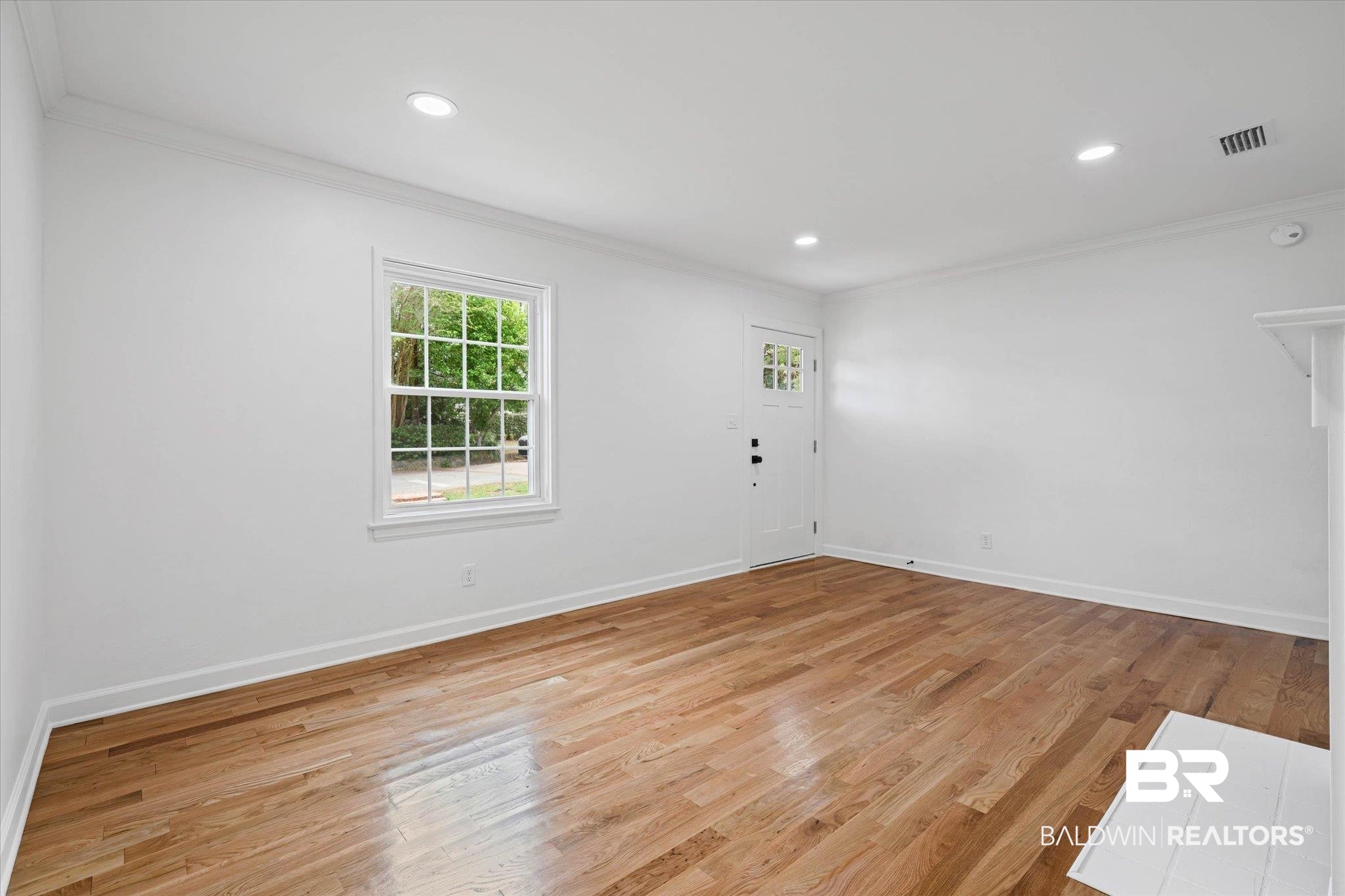41 Hathaway Road West Mobile, AL 36608 - Photo 5 of 24 Spare room with ornamental molding, light wood-style flooring, and recessed lighting