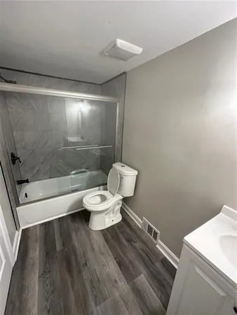 a bathroom with a sink and a toilet