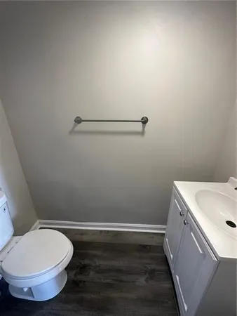 a bathroom with a toilet and a sink