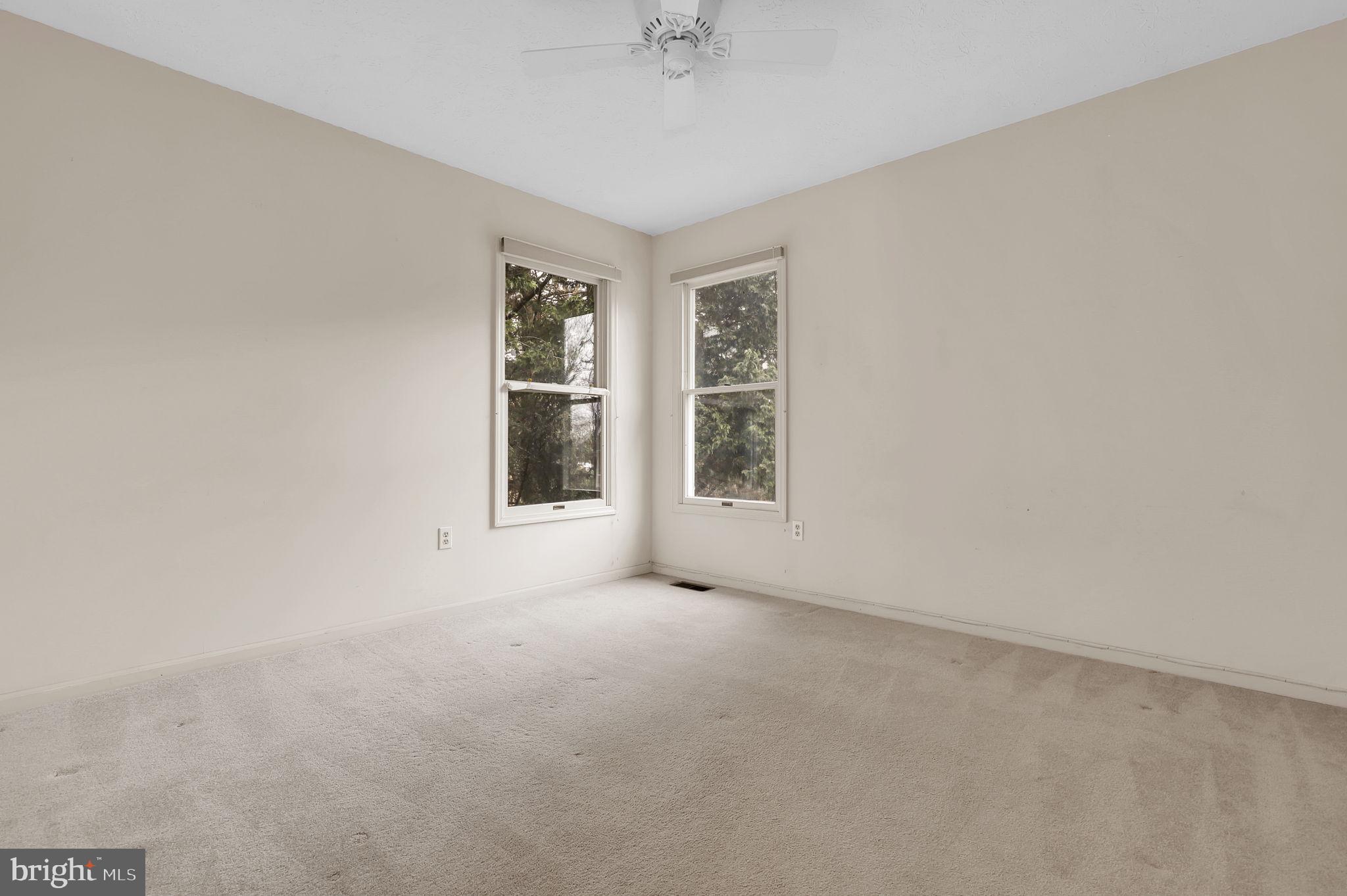 13404 Bregman Road Silver Spring, MD 20904 - Photo 39 of 53 an empty room with windows