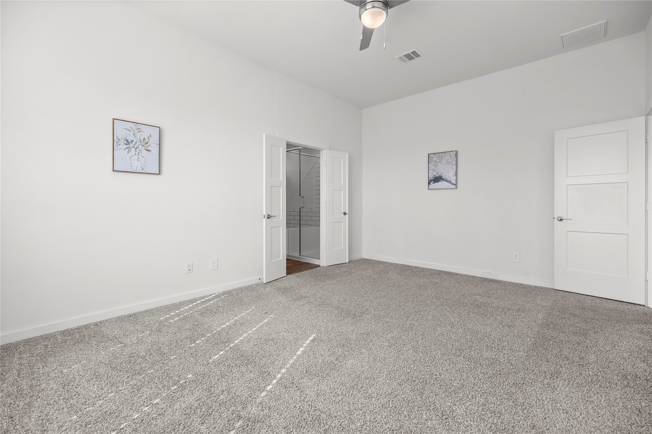 22803 Modica Rift Lane Katy, TX 77449 - Photo 20 of 30 a view of an empty room with a ceiling fan