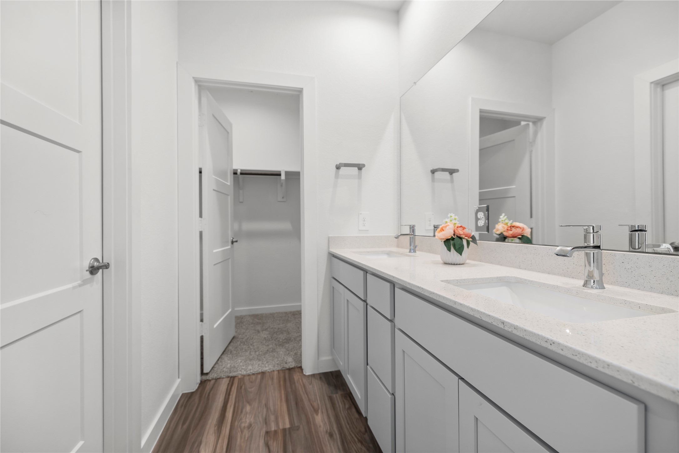 22803 Modica Rift Lane Katy, TX 77449 - Photo 22 of 30 a bathroom with a double vanity sink and mirror
