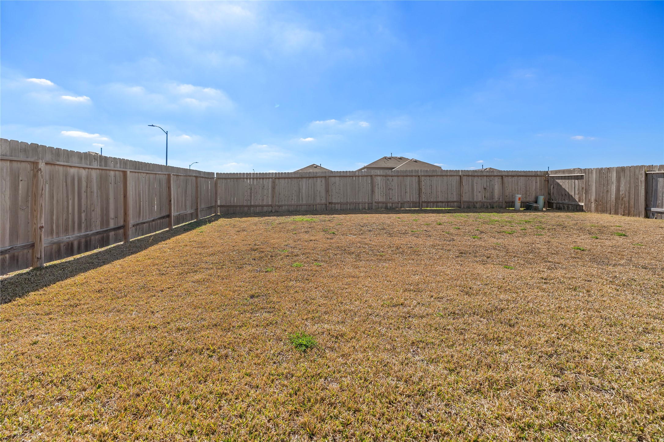 22803 Modica Rift Lane Katy, TX 77449 - Photo 28 of 30 a view of an outdoor space and a yard