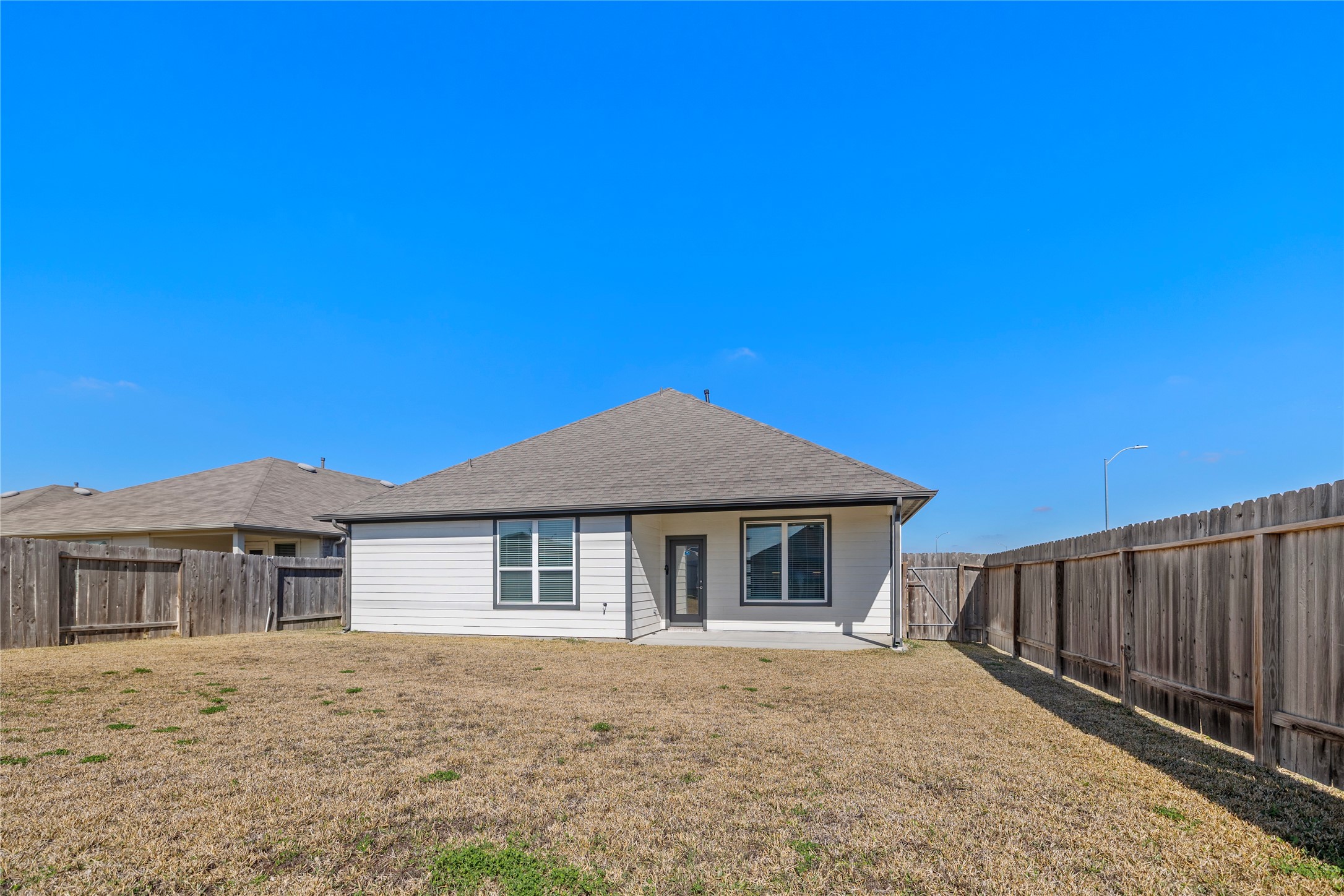 22803 Modica Rift Lane Katy, TX 77449 - Photo 30 of 30 a front view of a house with a yard