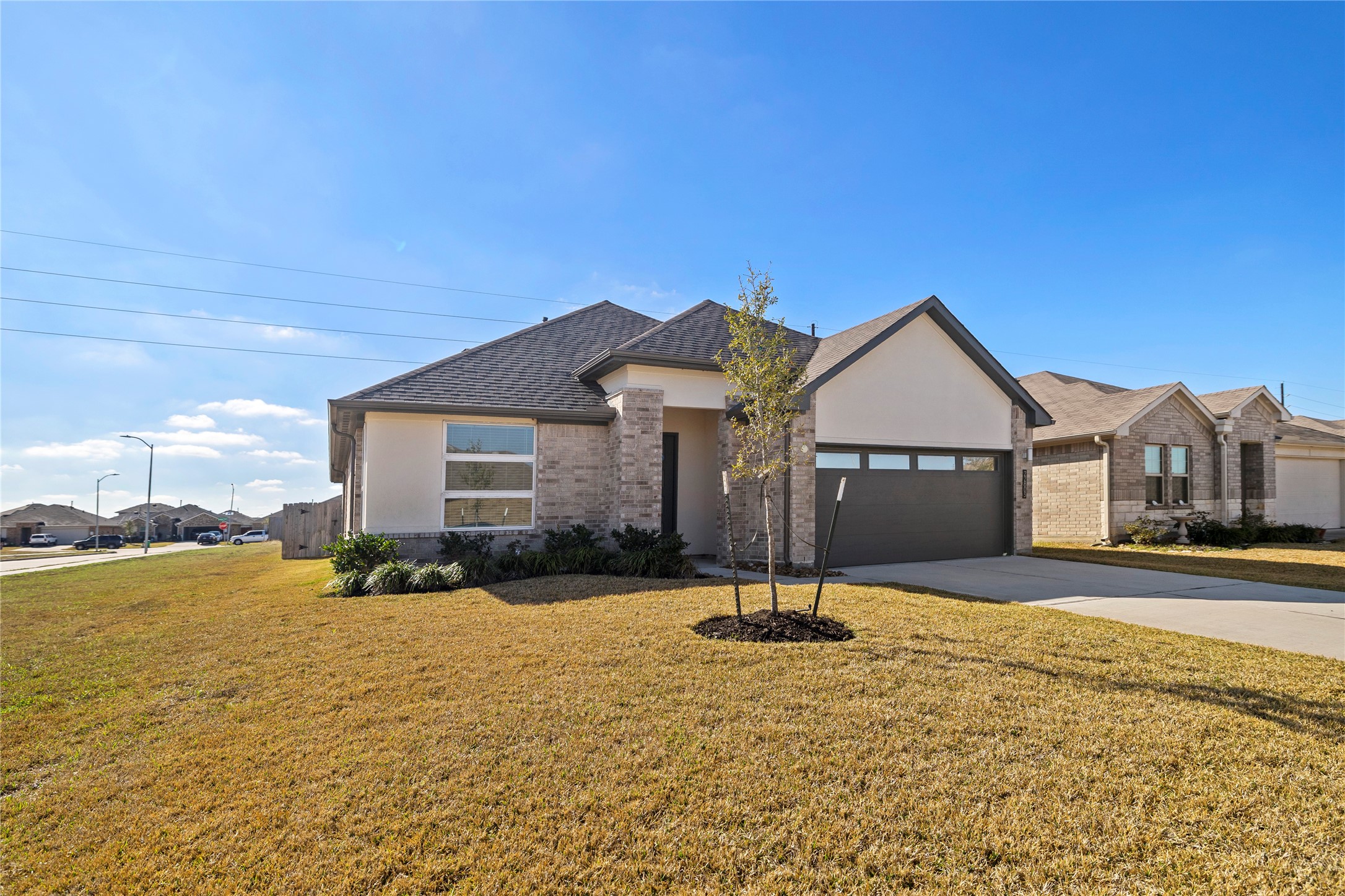22803 Modica Rift Lane Katy, TX 77449 - Photo 6 of 30 a front view of a house with a yard