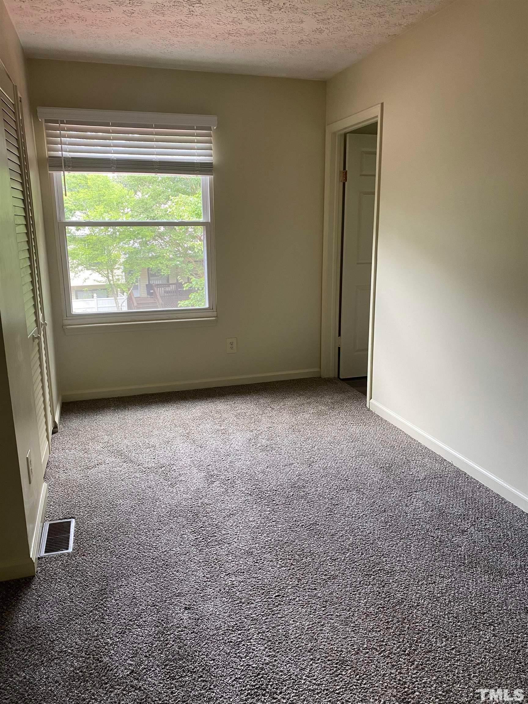 2801 Henslowe Drive Raleigh, NC 27603 - Photo 14 of 17 an empty room with a window
