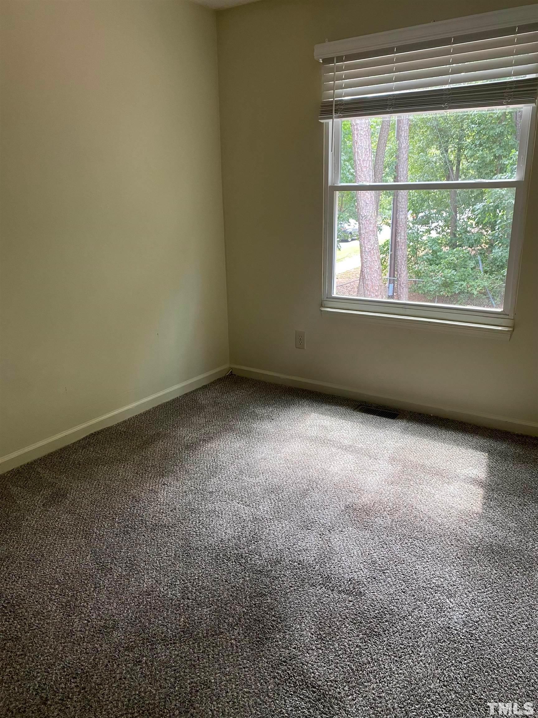 2801 Henslowe Drive Raleigh, NC 27603 - Photo 16 of 17 an empty room with a window