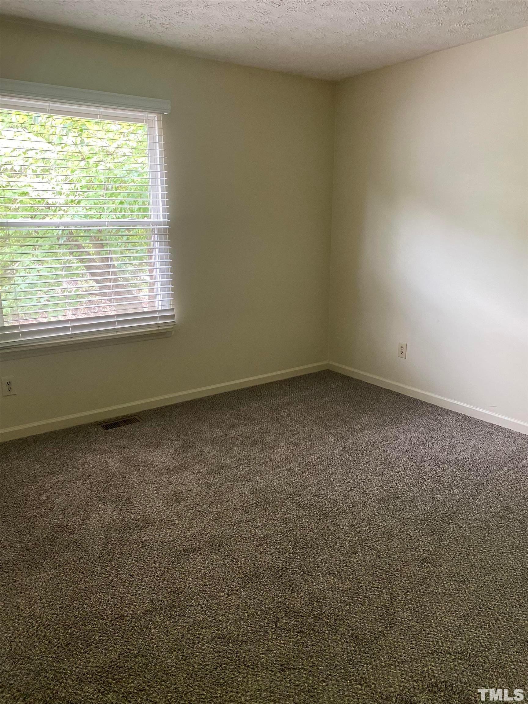 2801 Henslowe Drive Raleigh, NC 27603 - Photo 17 of 17 an empty room with a window