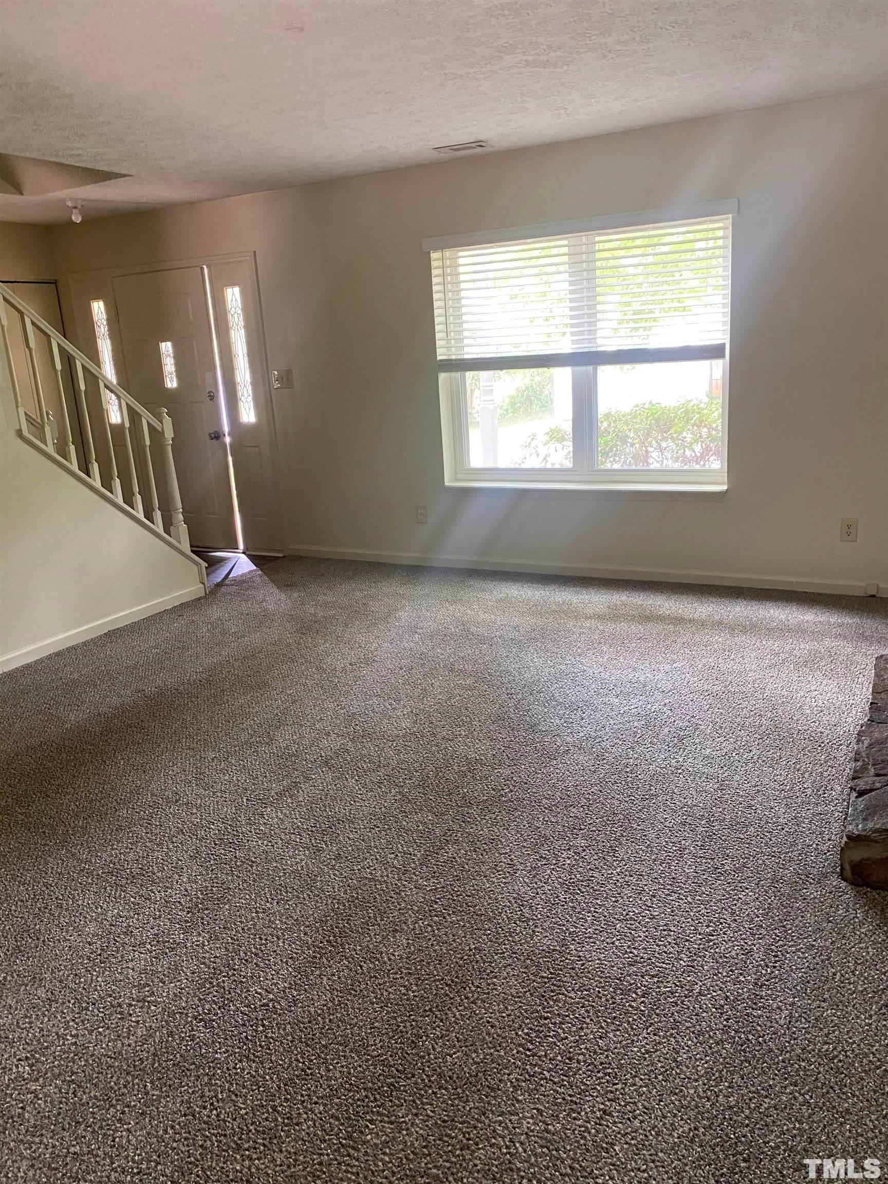 2801 Henslowe Drive Raleigh, NC 27603 - Photo 10 of 17 a view of an empty room with a window