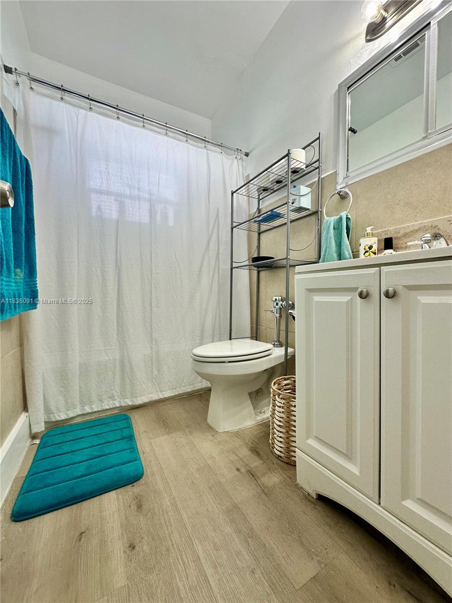 2200 South Ocean Drive, Unit N110 Hollywood, FL 33019 - Photo 12 of 21 a bathroom with a sink a toilet and shower