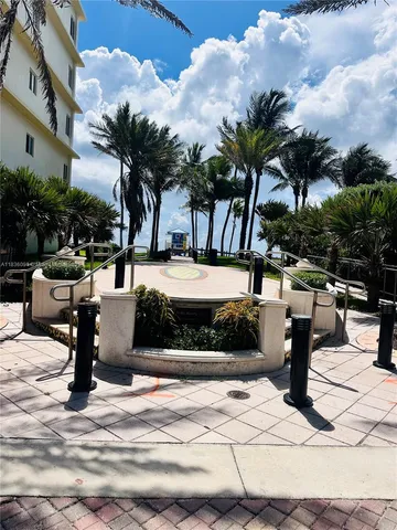 a view of a water fountain and television