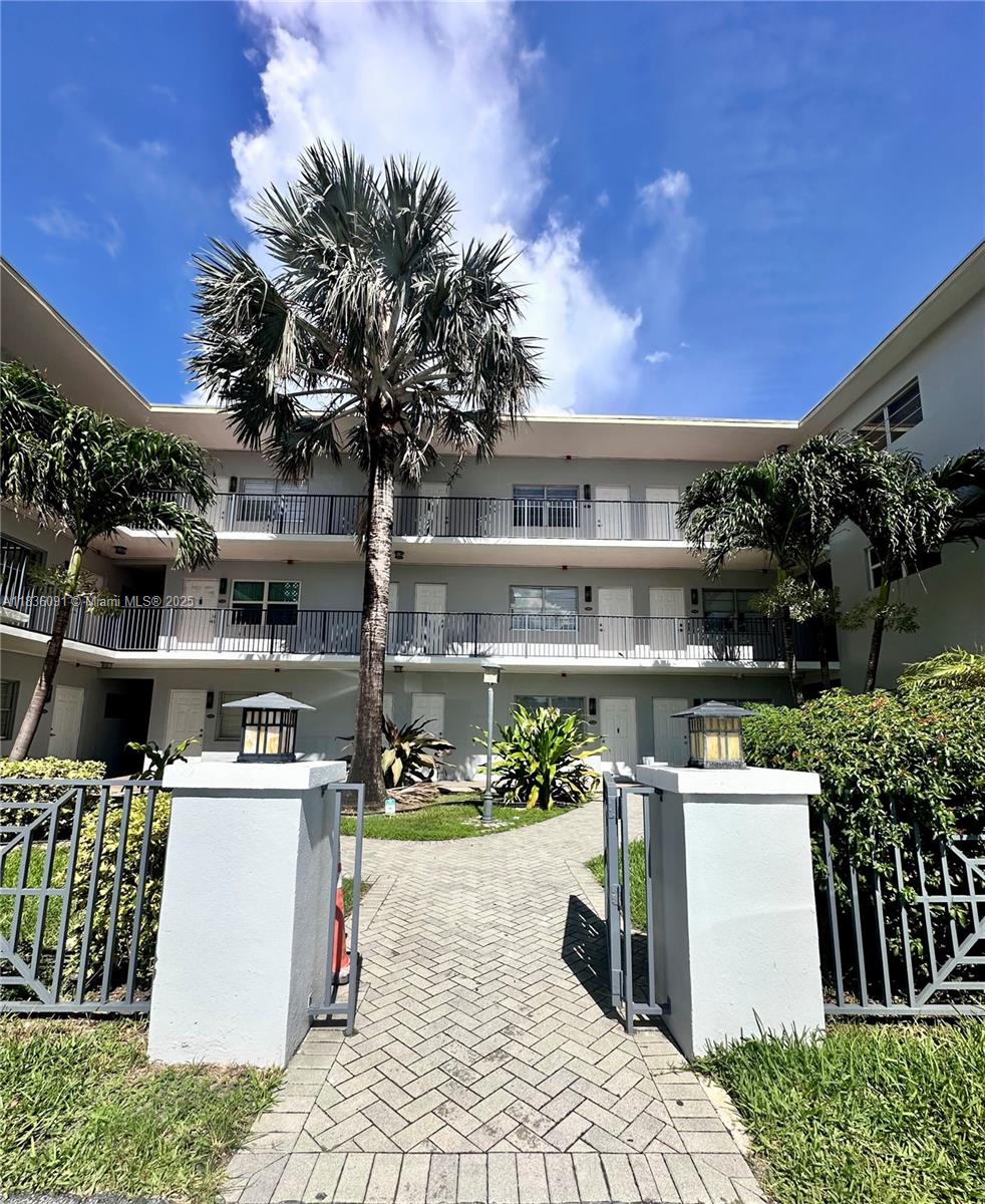 2200 South Ocean Drive, Unit N110 Hollywood, FL 33019 - Photo 5 of 21 a view of a chairs and table in a patio