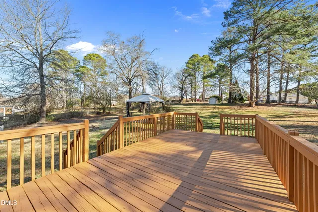 a view of a swimming pool with seating space