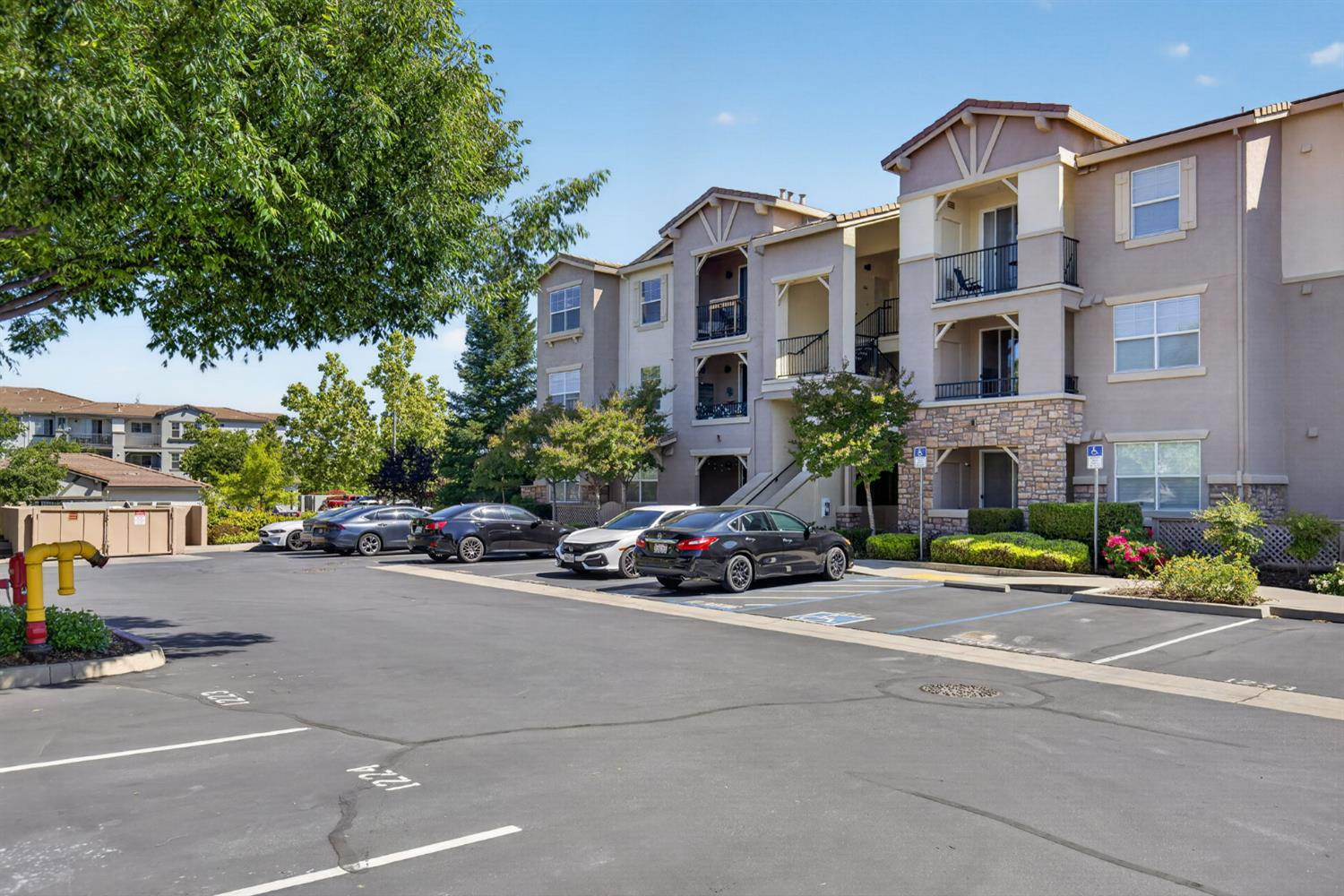 1251 Whitney Ranch Parkway, Unit 1231 Rocklin, CA 95765 - Photo 2 of 44 a car parked in front of a building