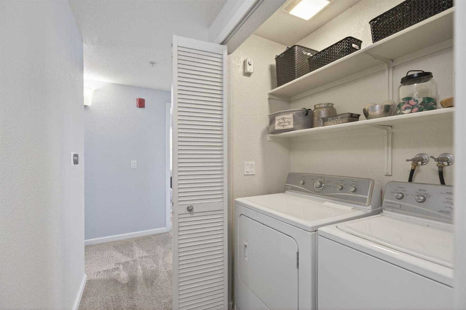 1251 Whitney Ranch Parkway, Unit 1231 Rocklin, CA 95765 - Photo 22 of 44 a utility room with dryer and washer