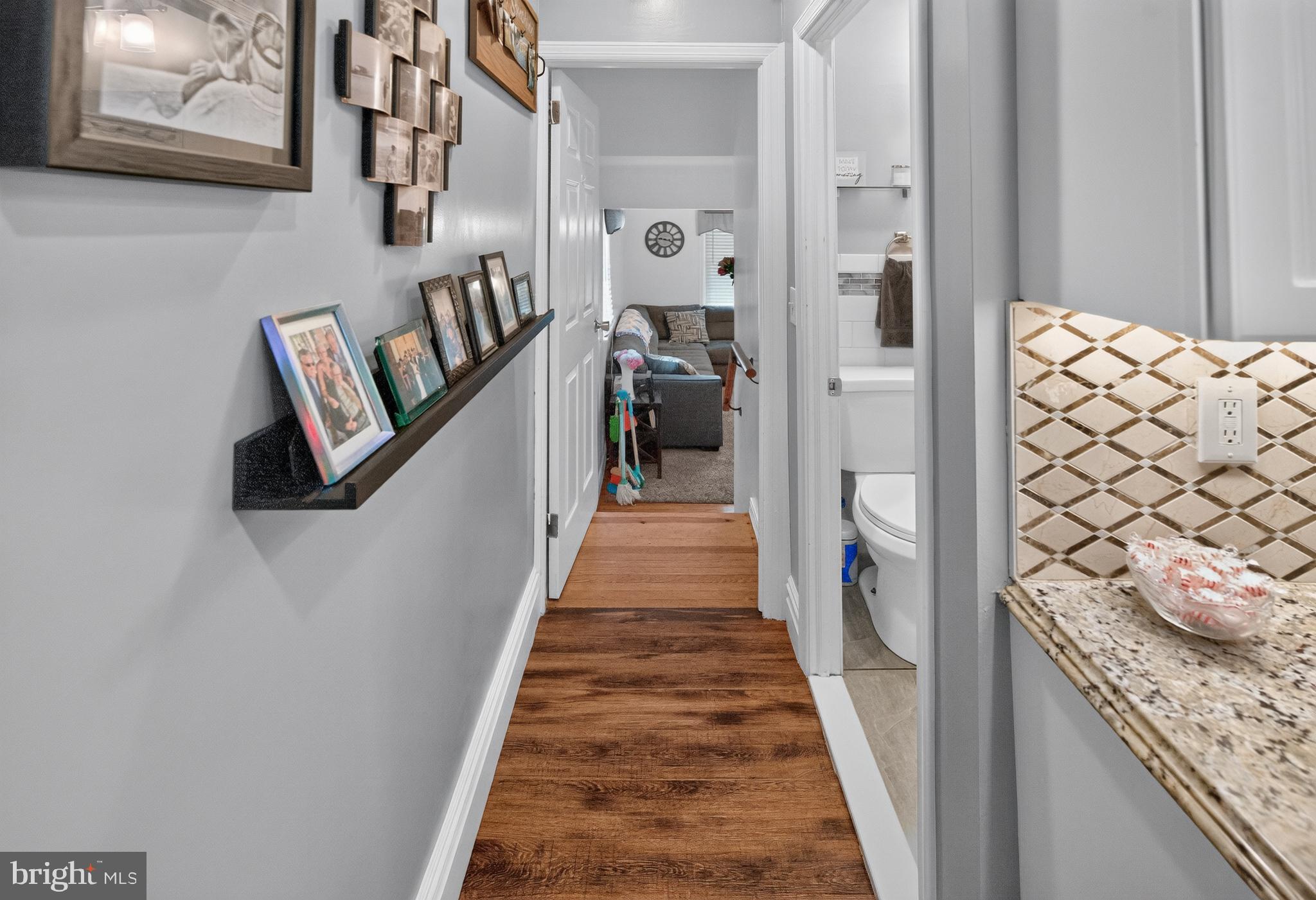 68 New Road Southampton, PA 18966 - Photo 12 of 27 a view of a hallway with wooden floor and staircase