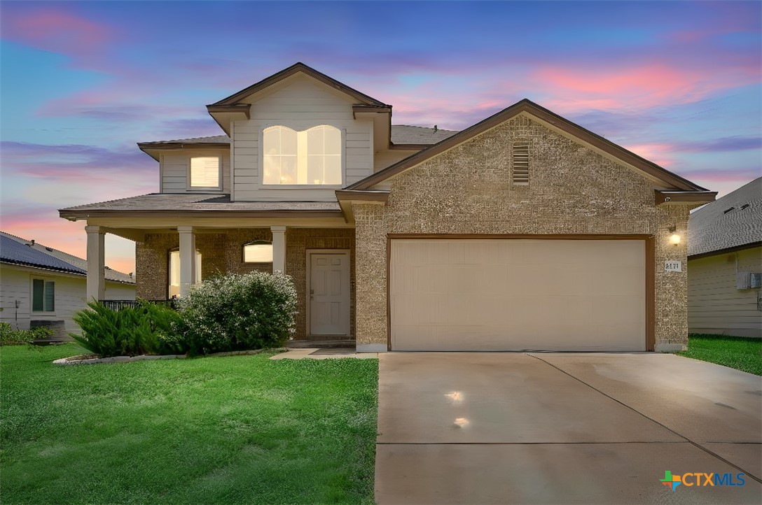 2511 Pintail Loop Copperas Cove, TX 76522 - Photo 1 of 26 a front view of a house with a yard and garage