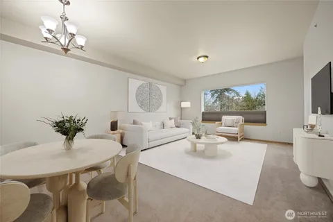 a view of a big room with windows