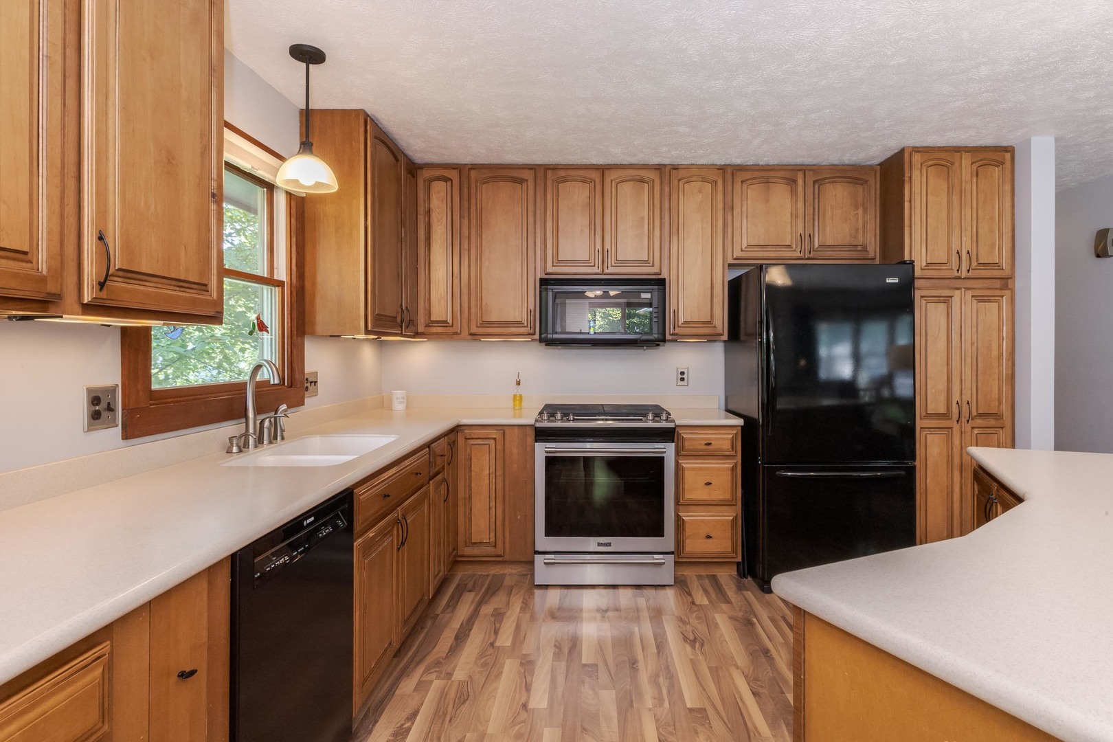 314 North Bone Drive Normal, IL 61761 - Photo 13 of 45 a kitchen with a refrigerator stove and sink