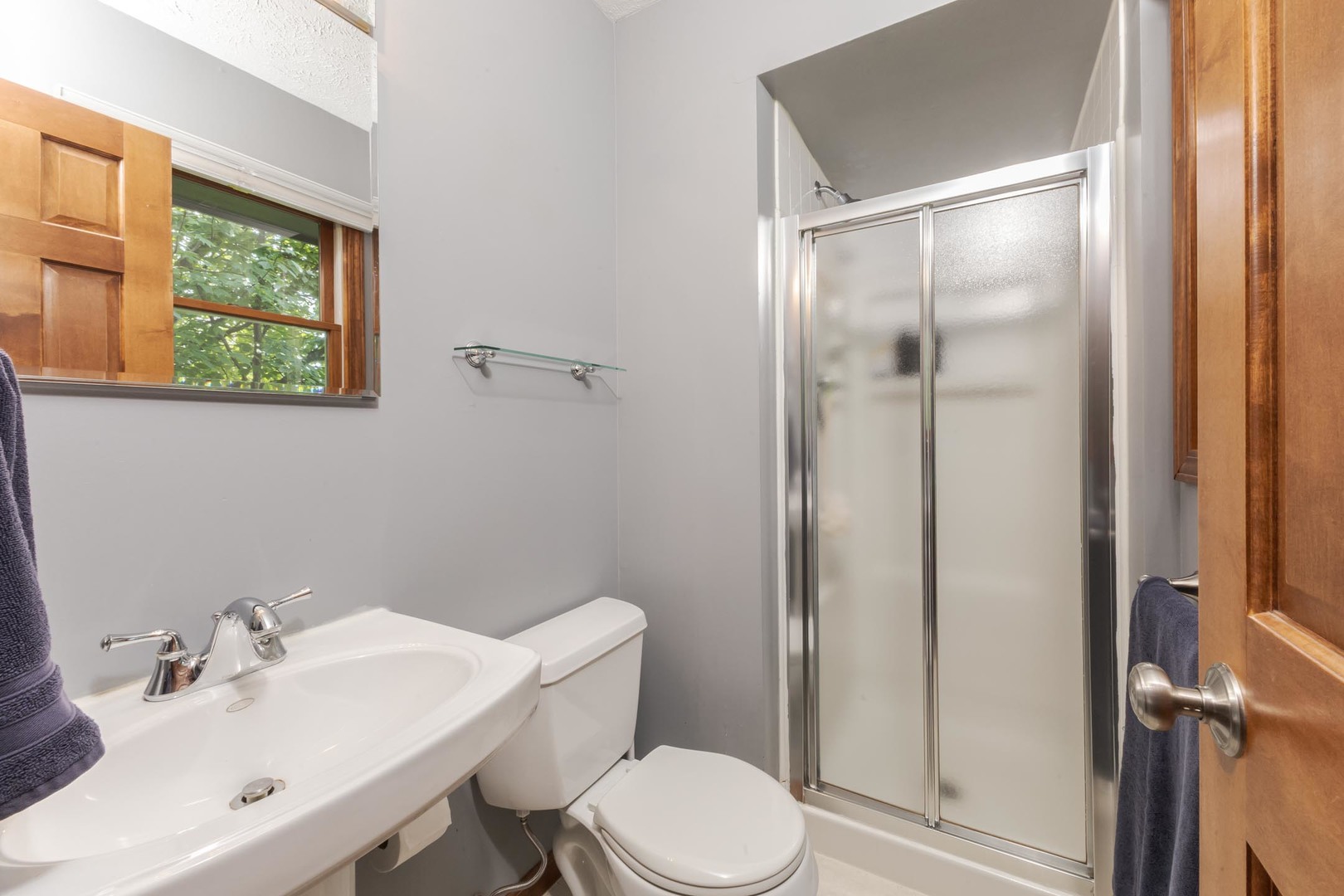 314 North Bone Drive Normal, IL 61761 - Photo 19 of 45 a bathroom with a sink toilet and shower