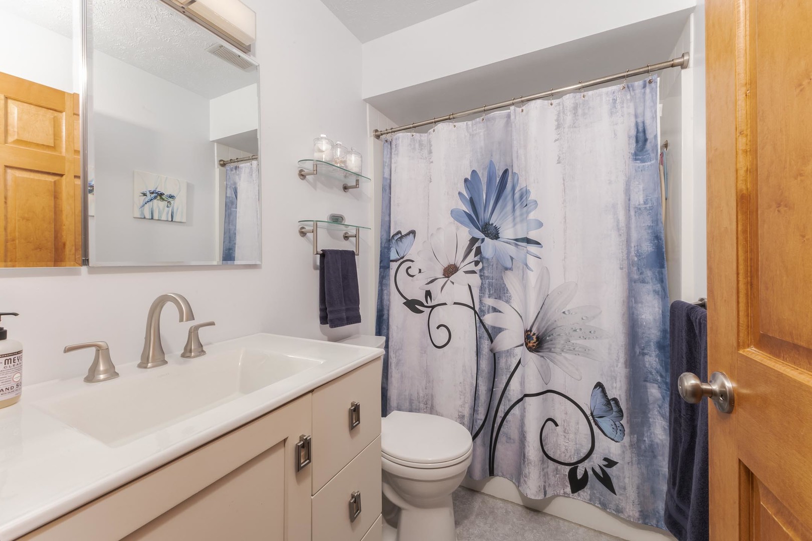 314 North Bone Drive Normal, IL 61761 - Photo 21 of 45 a bathroom with a toilet sink and mirror