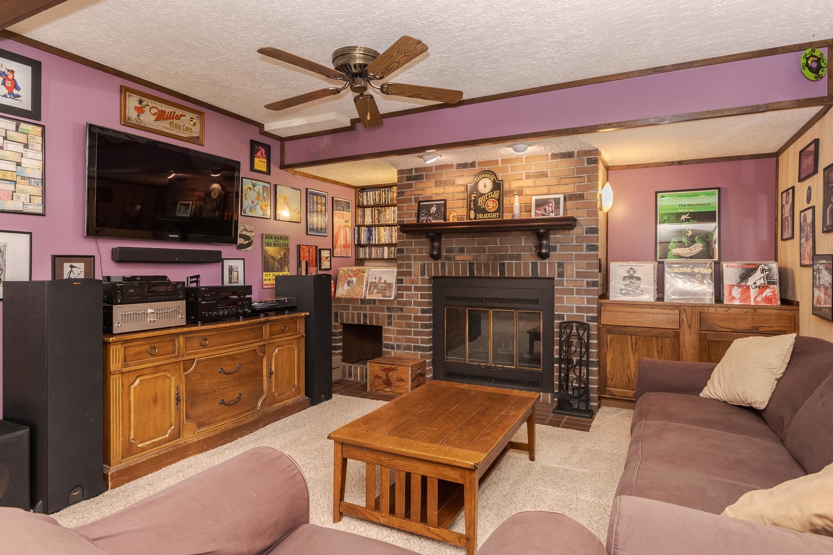 314 North Bone Drive Normal, IL 61761 - Photo 29 of 45 a living room with stainless steel appliances furniture a flat screen tv and a fireplace