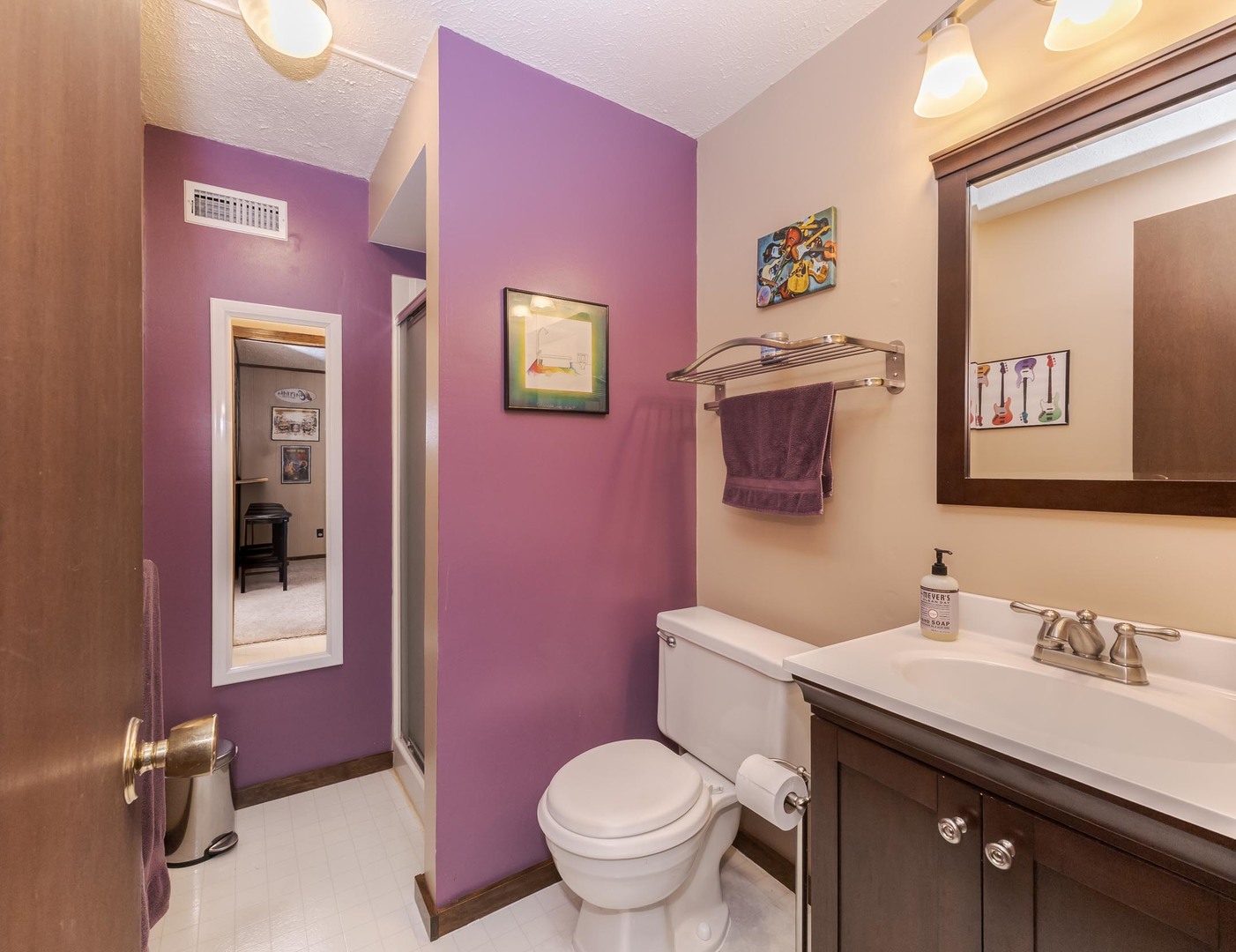 314 North Bone Drive Normal, IL 61761 - Photo 32 of 45 a bathroom with a granite countertop toilet sink and mirror