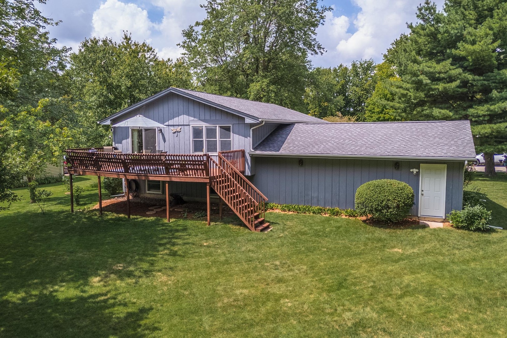 314 North Bone Drive Normal, IL 61761 - Photo 35 of 45 a view of a house with a yard and sitting area