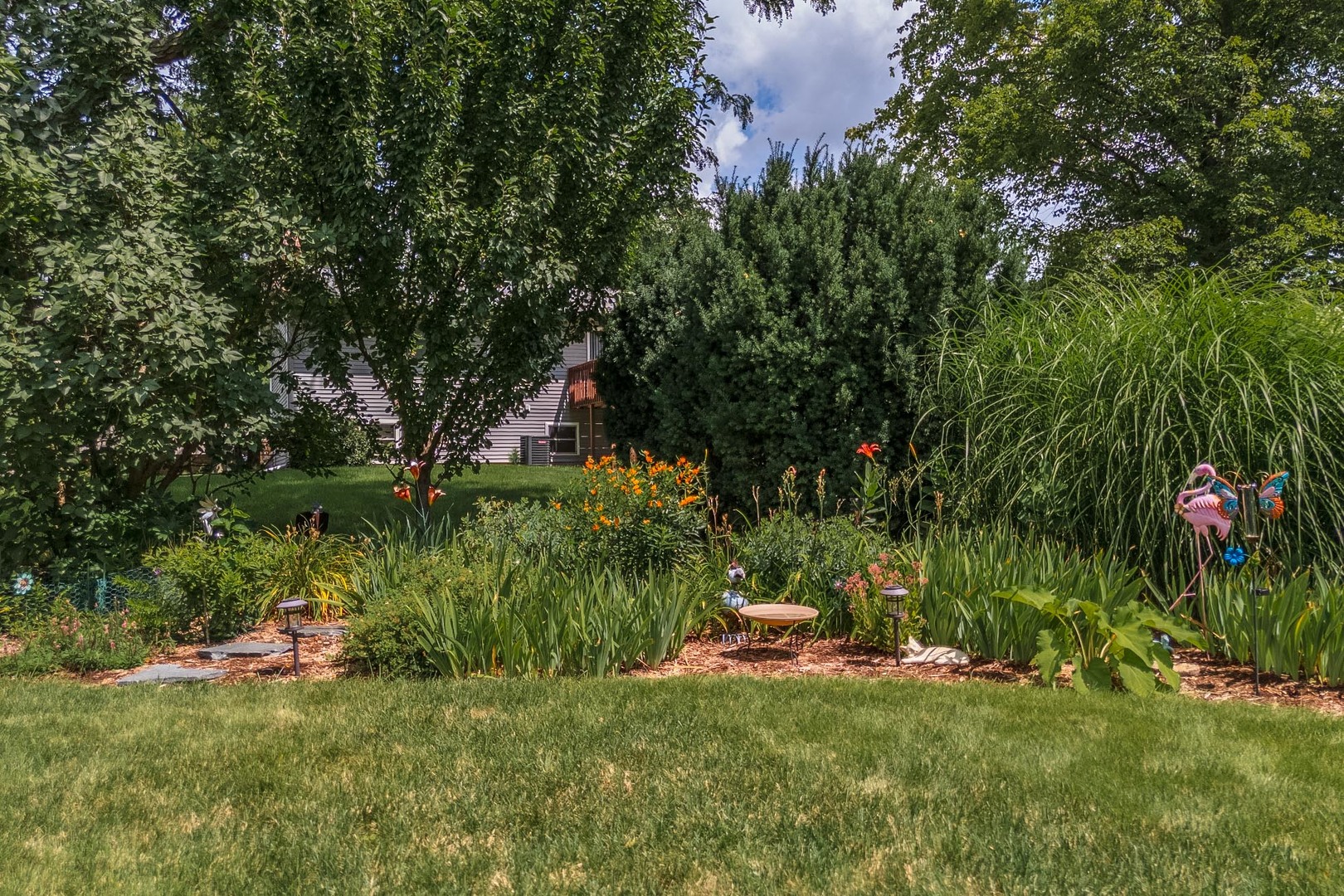 314 North Bone Drive Normal, IL 61761 - Photo 43 of 45 a view of a backyard with couches and grass