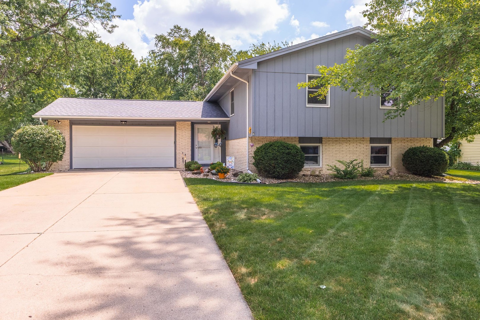 314 North Bone Drive Normal, IL 61761 - Photo 45 of 45 a front view of a house with a garden