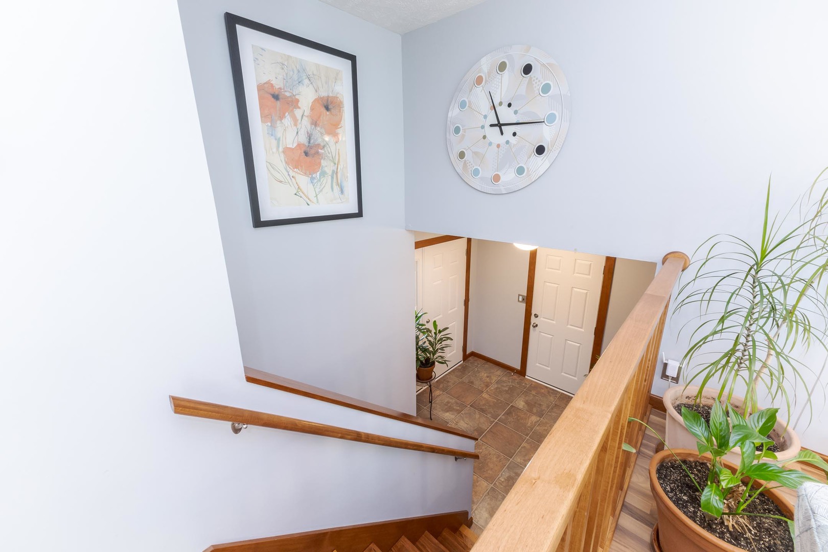 314 North Bone Drive Normal, IL 61761 - Photo 6 of 45 a view of a hallway with paintings on the wall