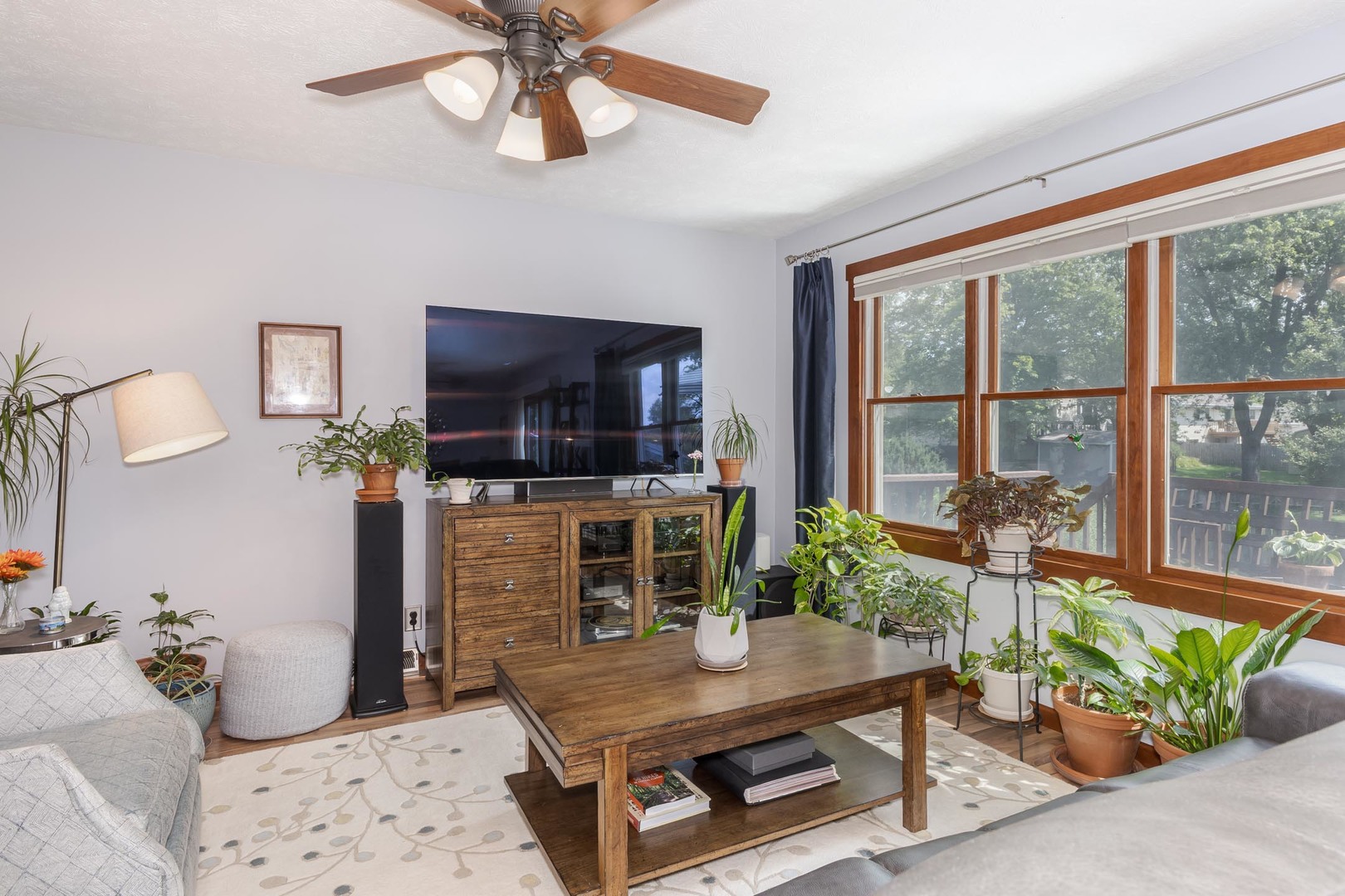 314 North Bone Drive Normal, IL 61761 - Photo 9 of 45 a living room with furniture a flat screen tv and a window