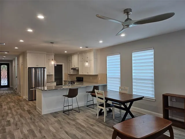 a view of a dining room with furniture